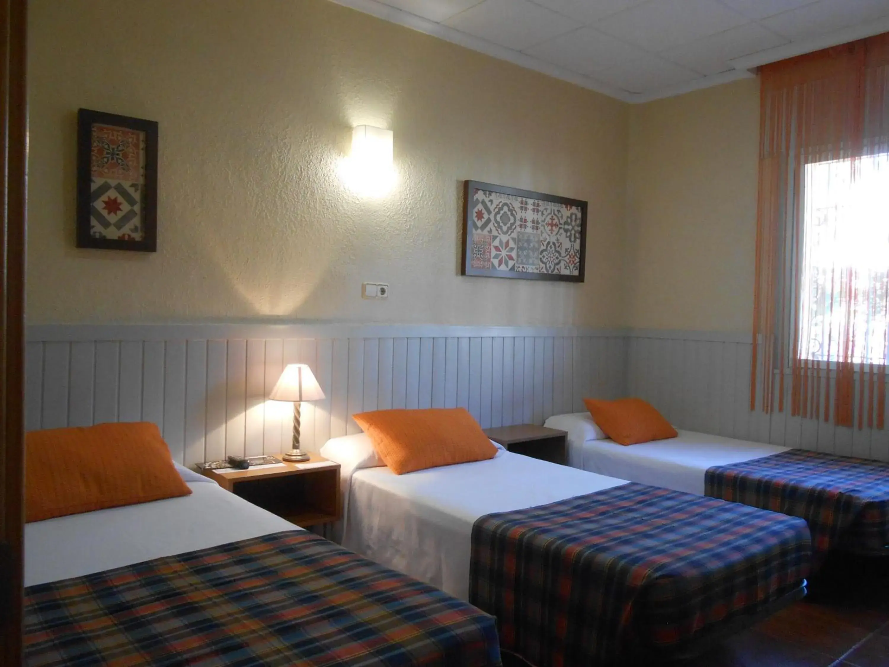 Triple Room in Hostal El Callejón Triple Room in Hostal El Callejón