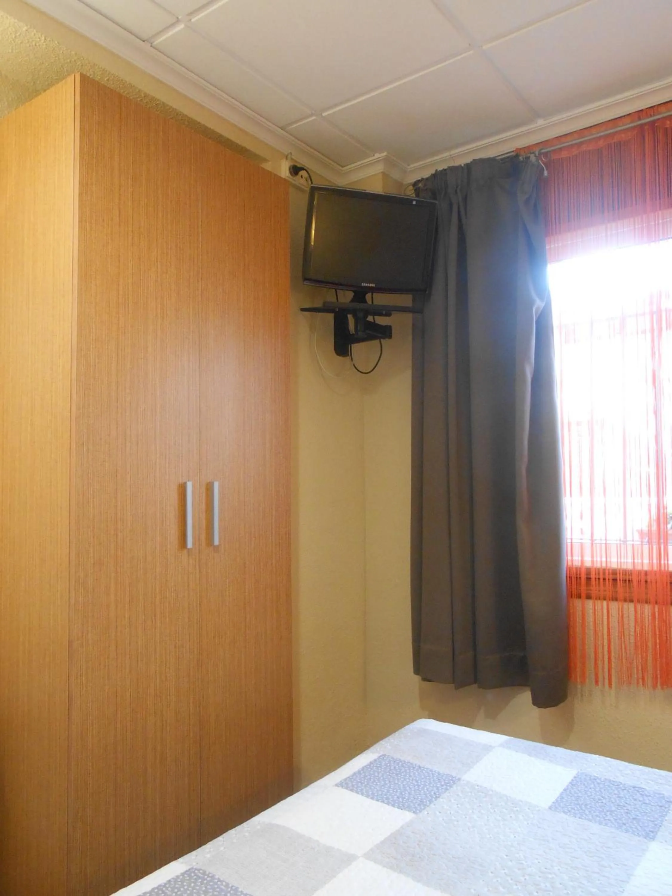 Bed in Hostal El Callejón