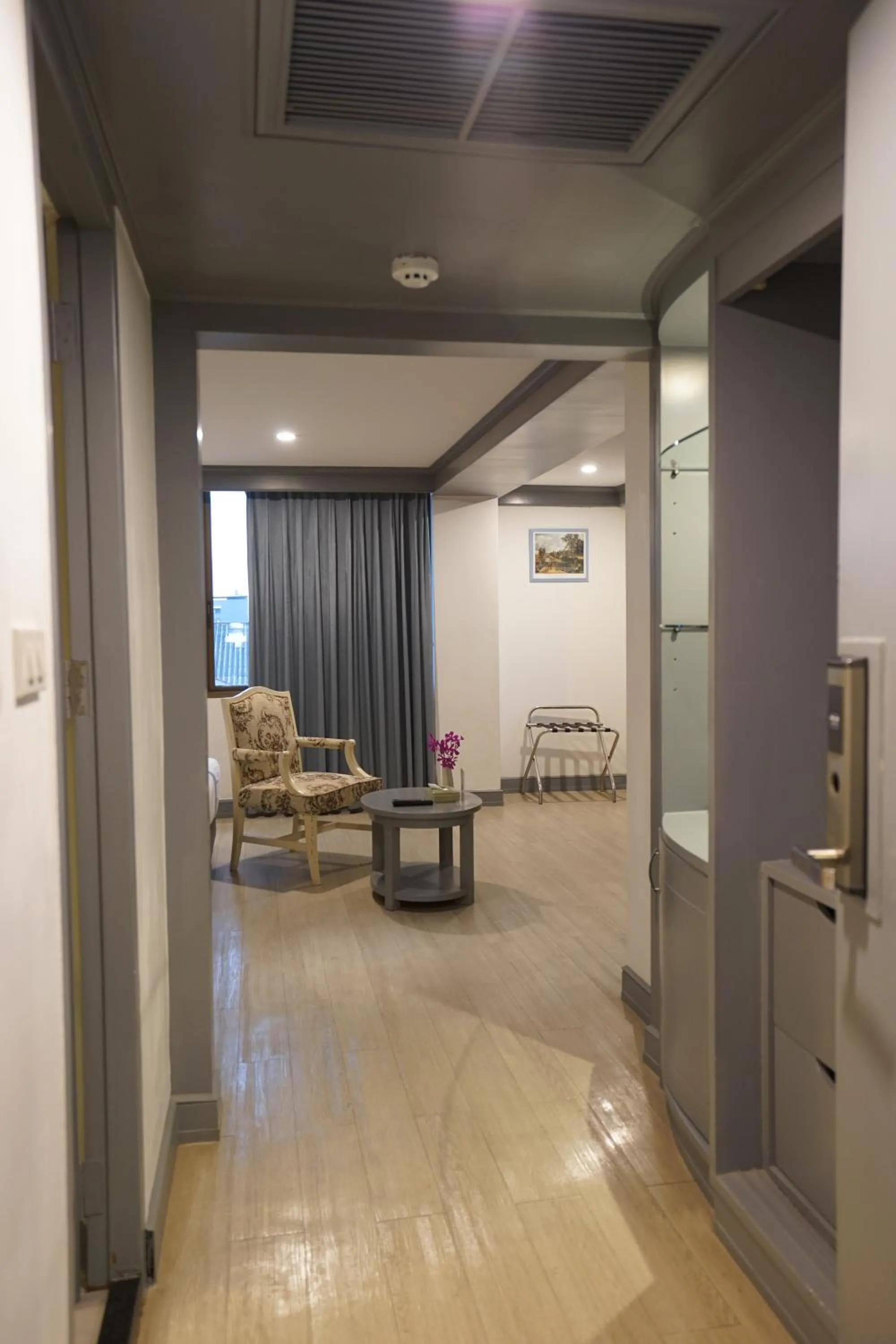 Living room in King Park Avenue Hotel Bangkok