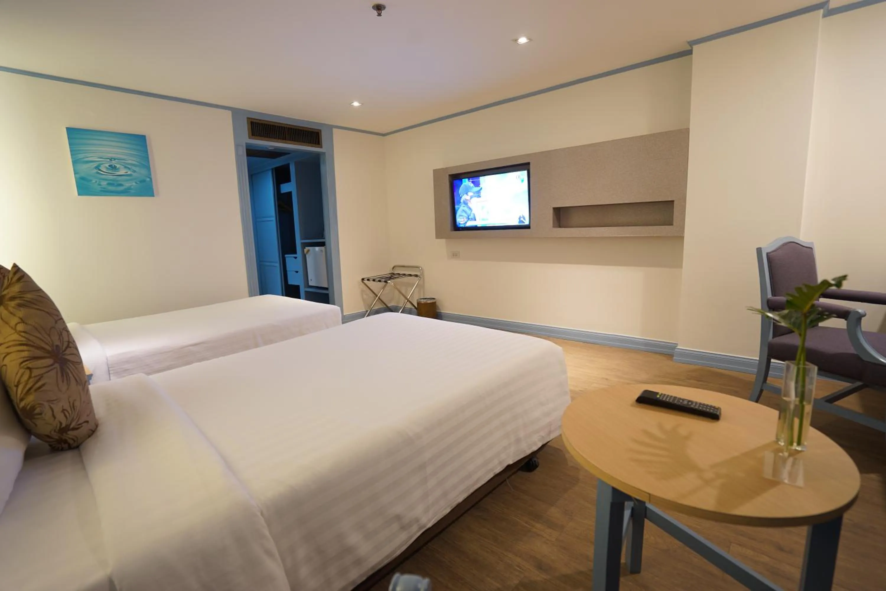 Bed in King Park Avenue Hotel Bangkok