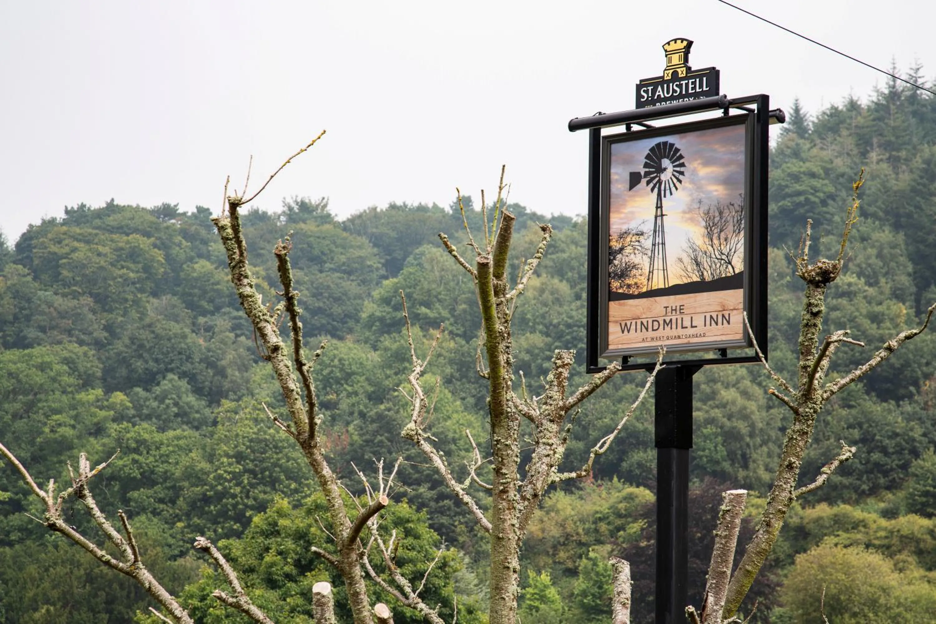 Property logo or sign in The Windmill Inn