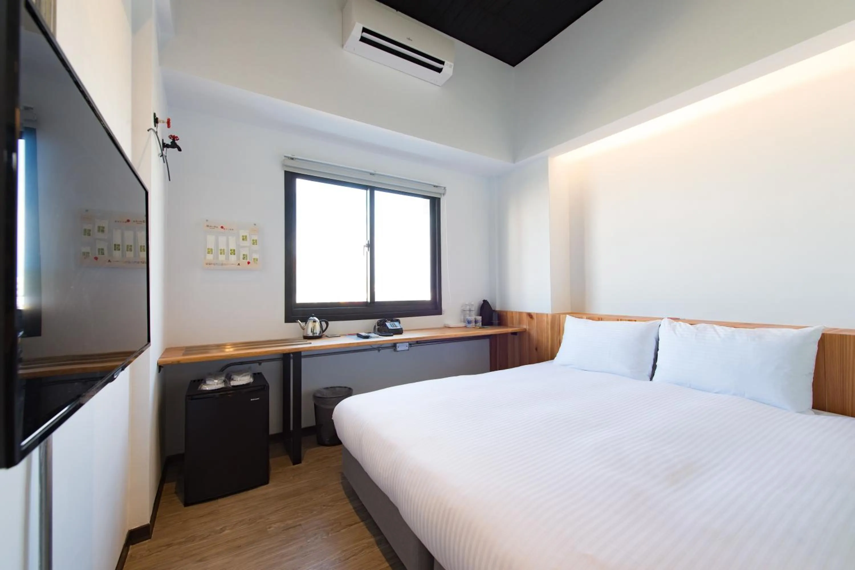 Photo of the whole room, Bed in Traveller Inn TieHua Cultural and Creative Hotel
