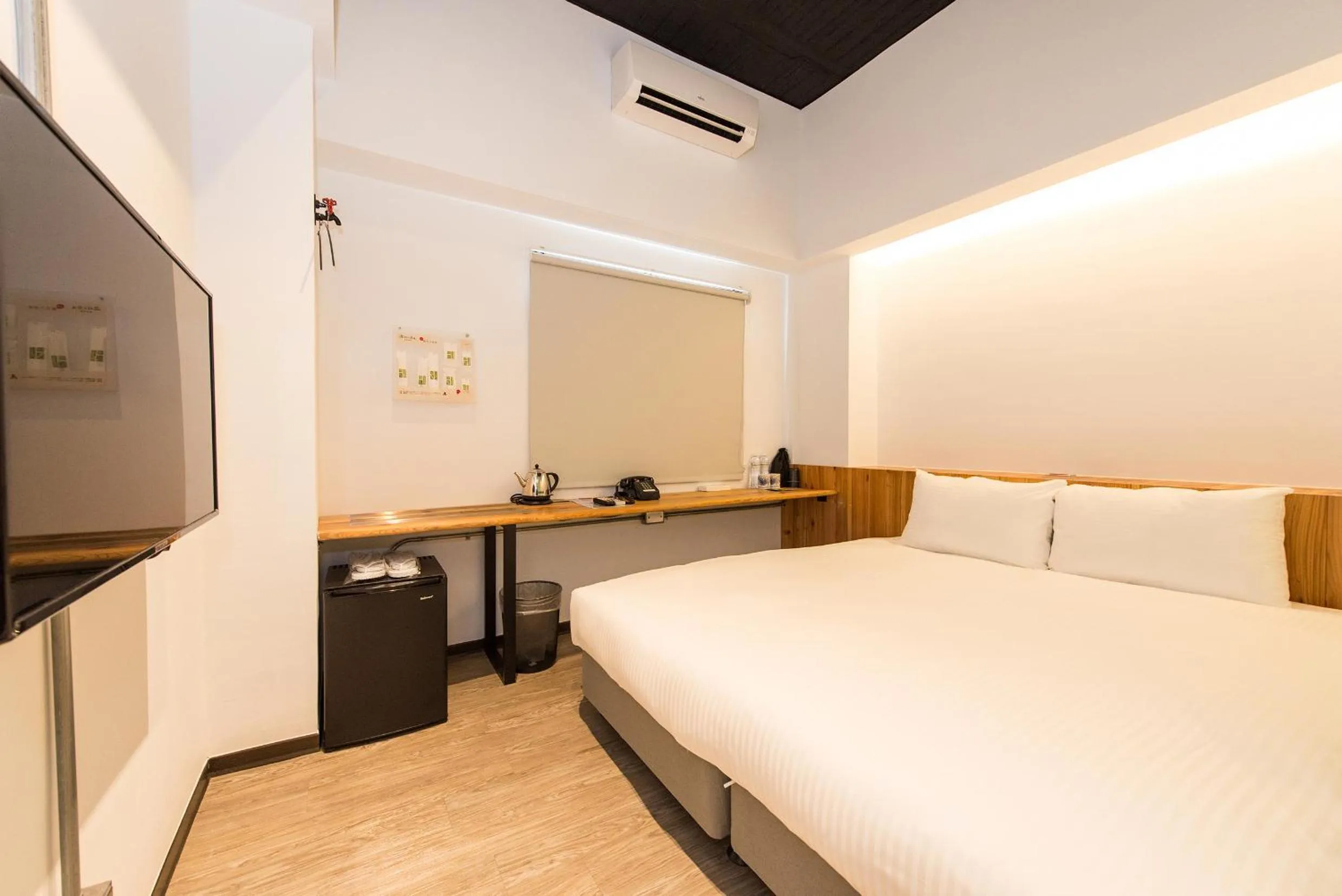Photo of the whole room, Bed in Traveller Inn TieHua Cultural and Creative Hotel