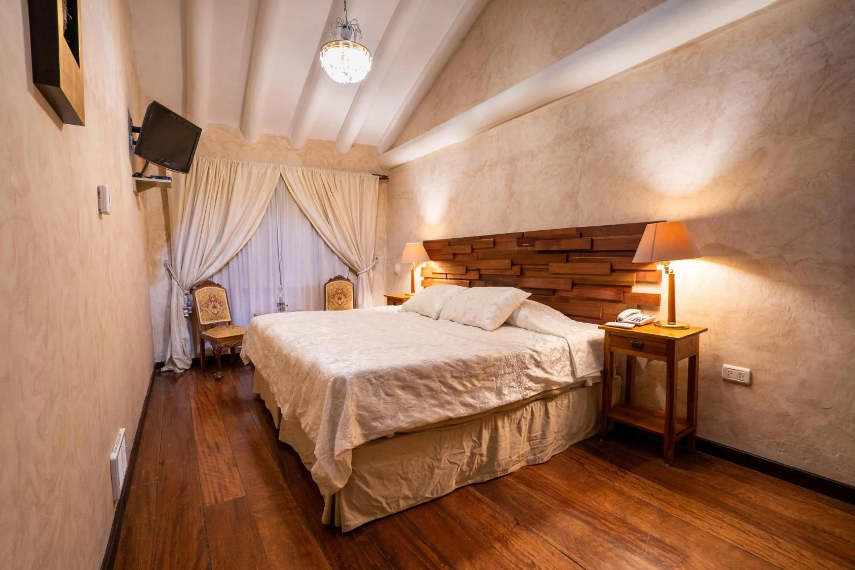 Bed in Andean Wings Boutique Hotel