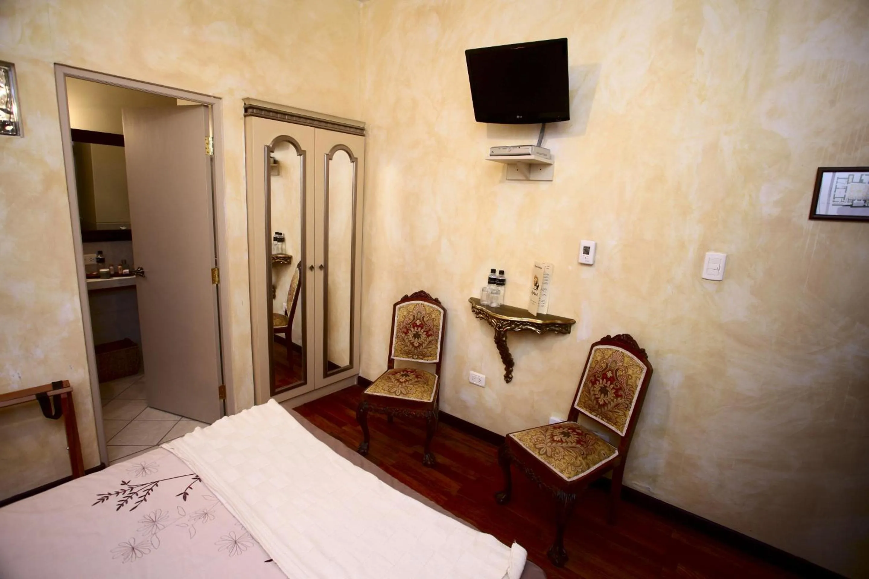 TV and multimedia, TV/Entertainment Center in Andean Wings Boutique Hotel