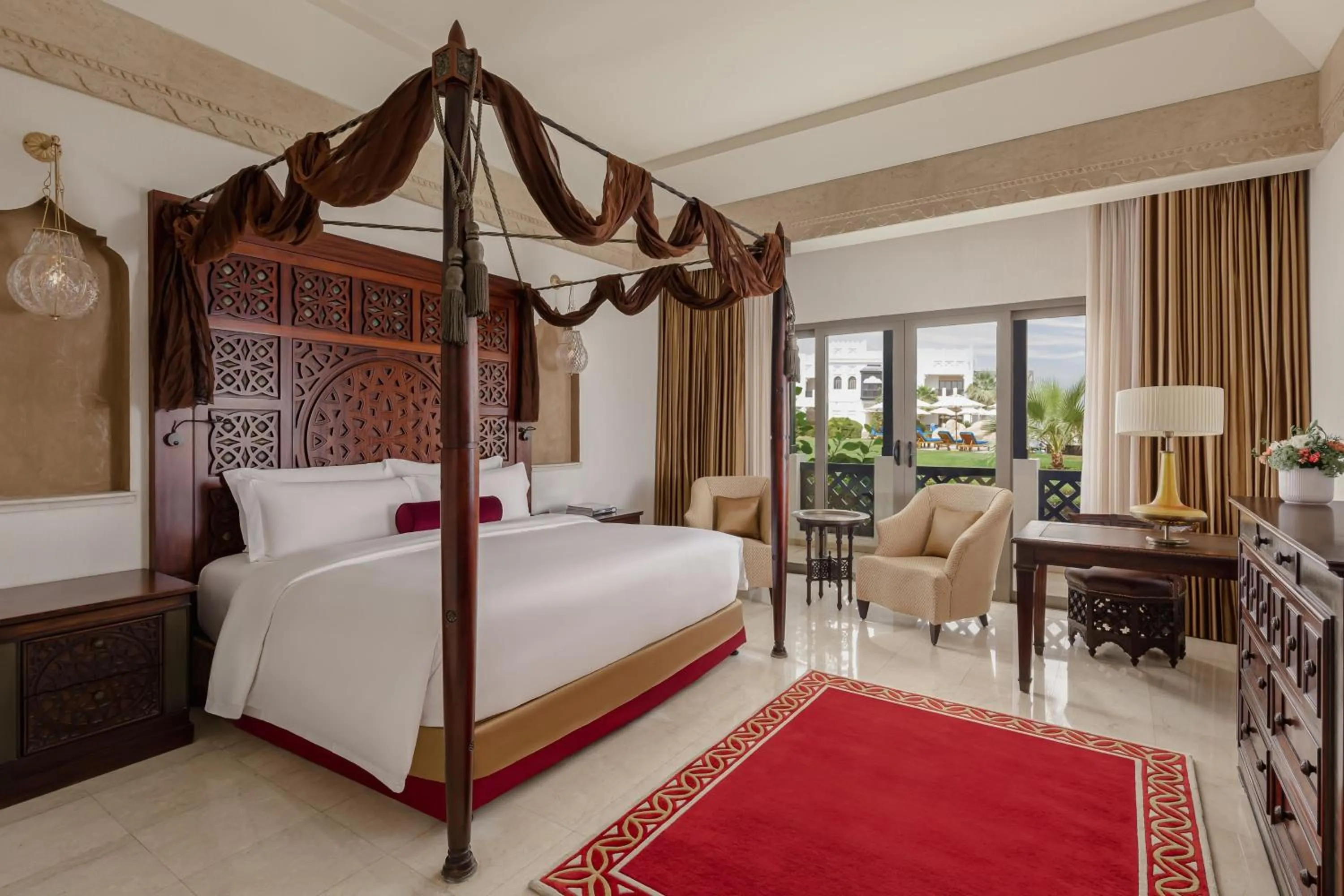 Swimming pool, Bed in Sharq Village & Spa, a Ritz-Carlton Hotel