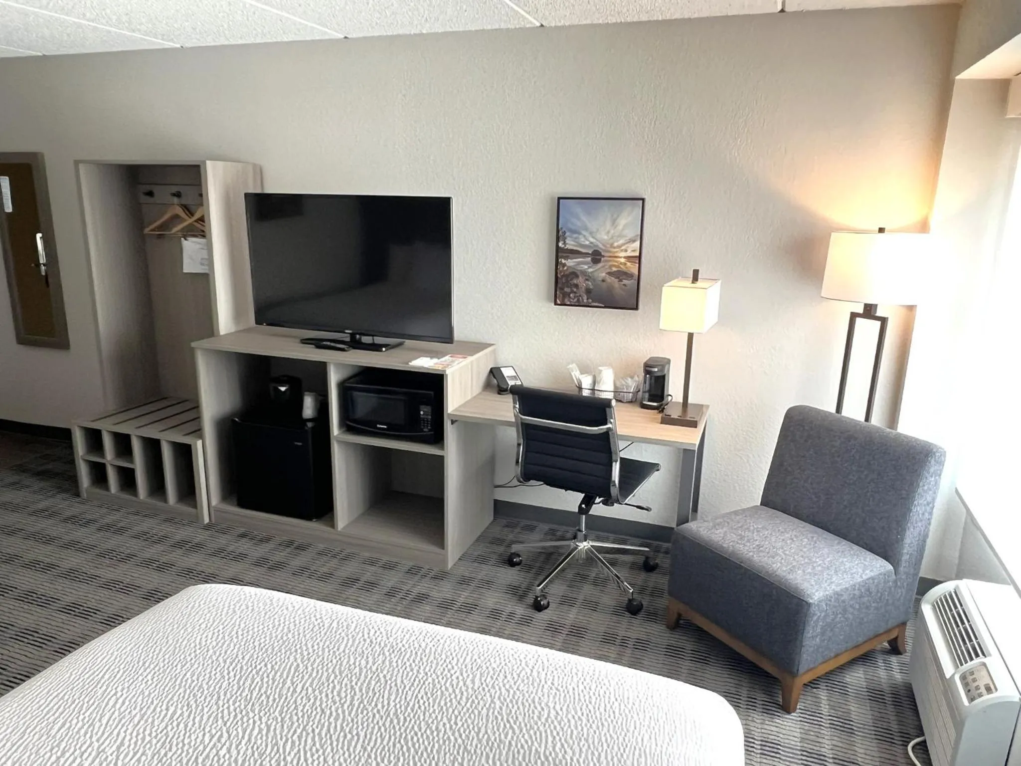 Bed in AmericInn by Wyndham Baxter Brainerd