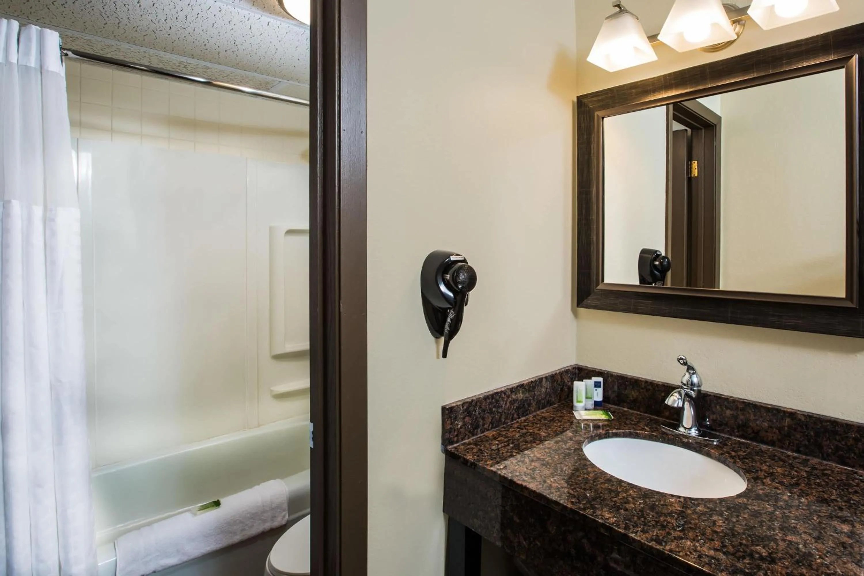 Bathroom in AmericInn by Wyndham Baxter Brainerd