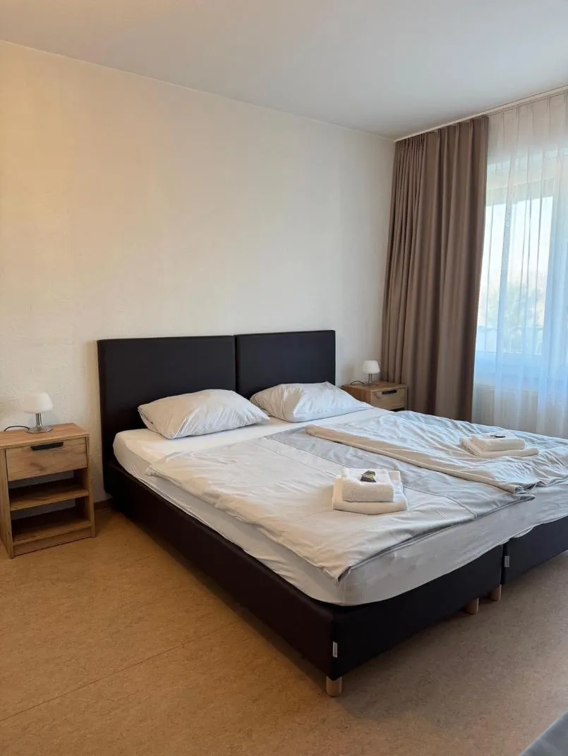 Photo of the whole room, Bed in Gästehaus Haßloch/Pfalz