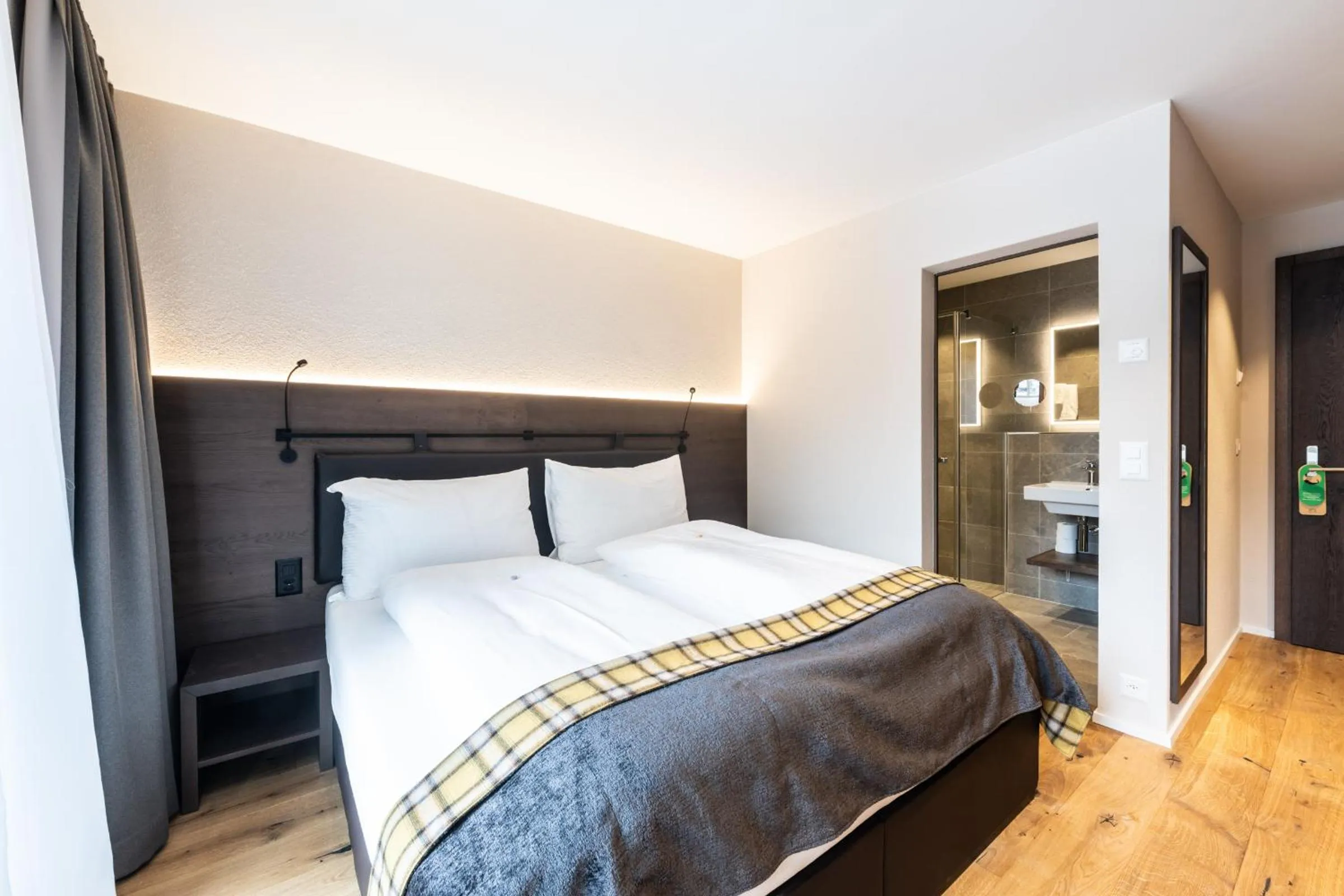 Photo of the whole room, Bed in Posthotel Valbella - Berge, Spa & Wir