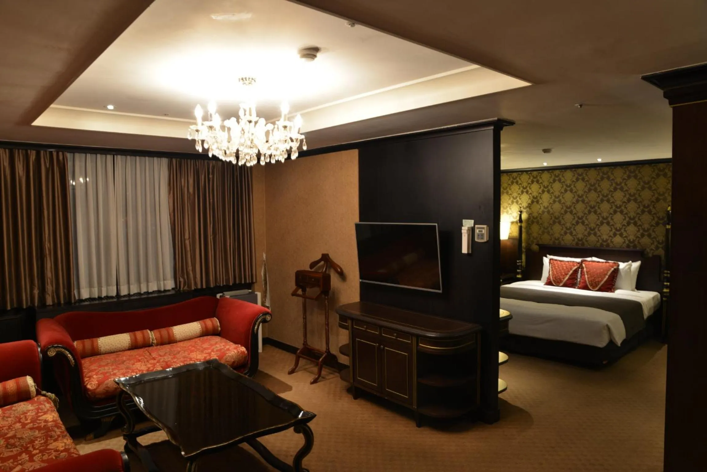 Living room, Bed in Ramada by Wyndham Songdo