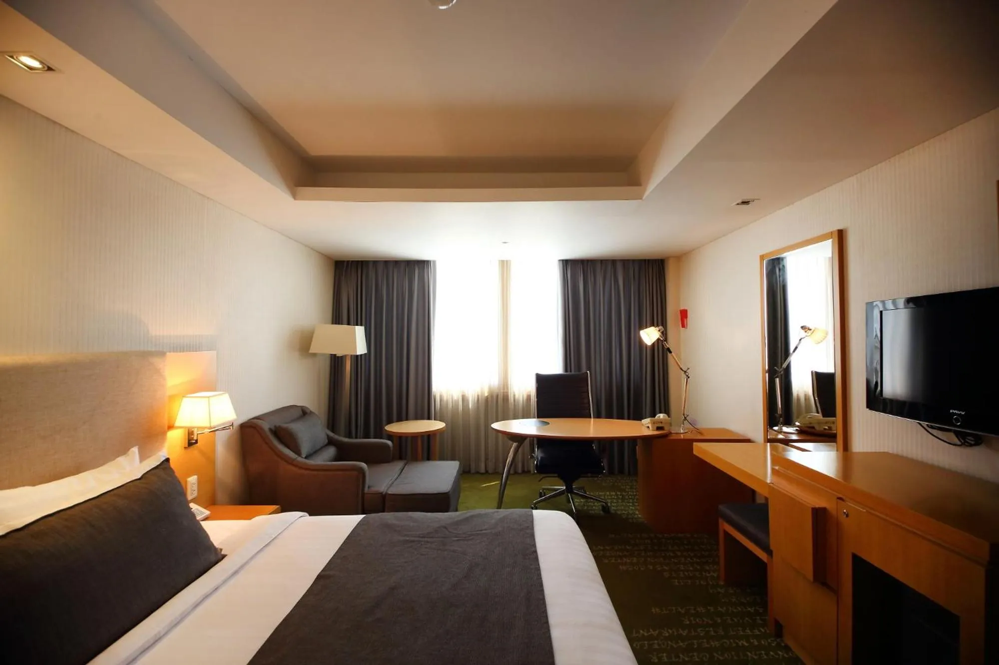 Bed in Ramada by Wyndham Songdo