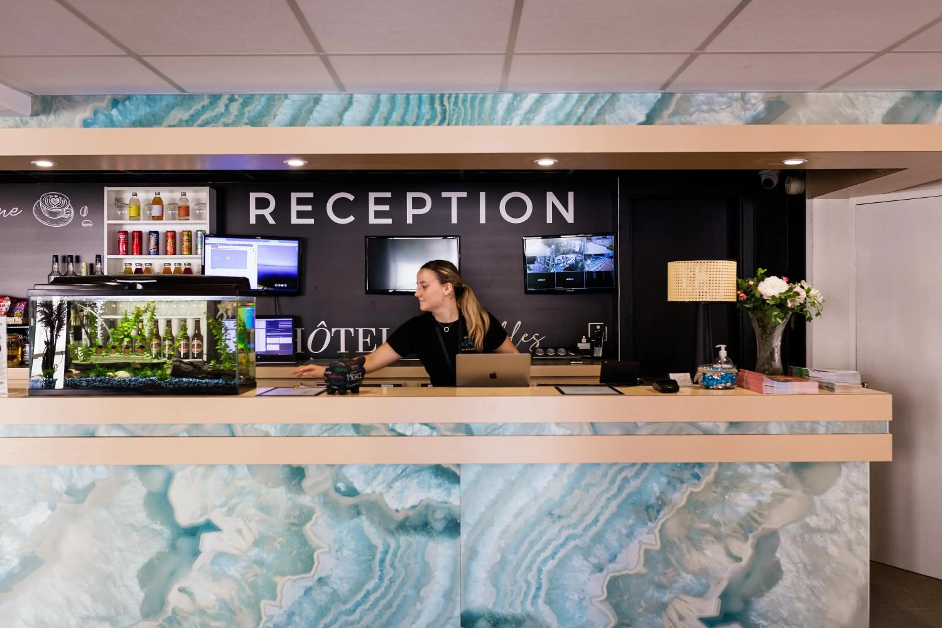 Property logo or sign in Hôtel Les Sables - Urban Style - by Logis Hotels