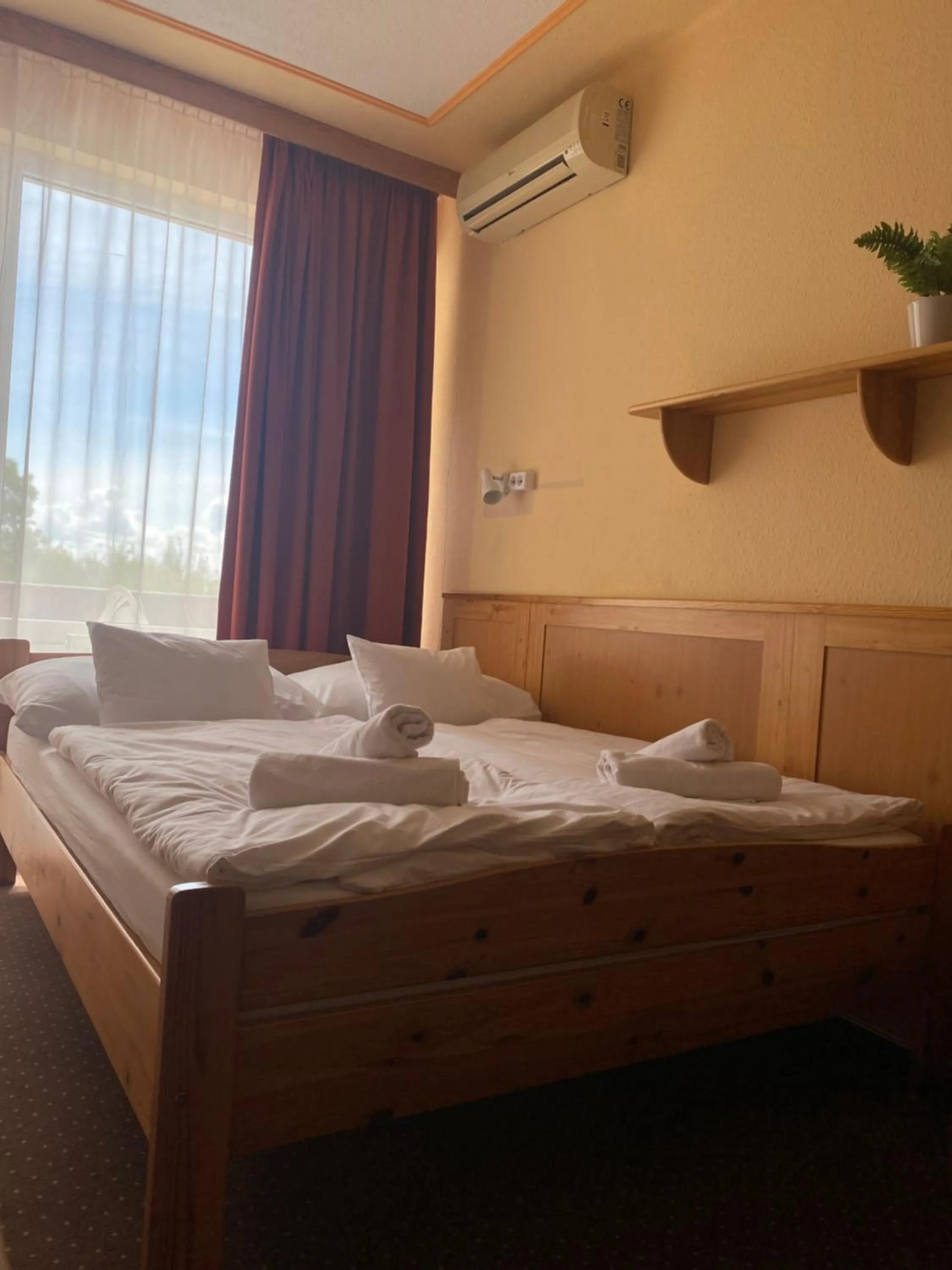 Bed in Nereus Park Hotel