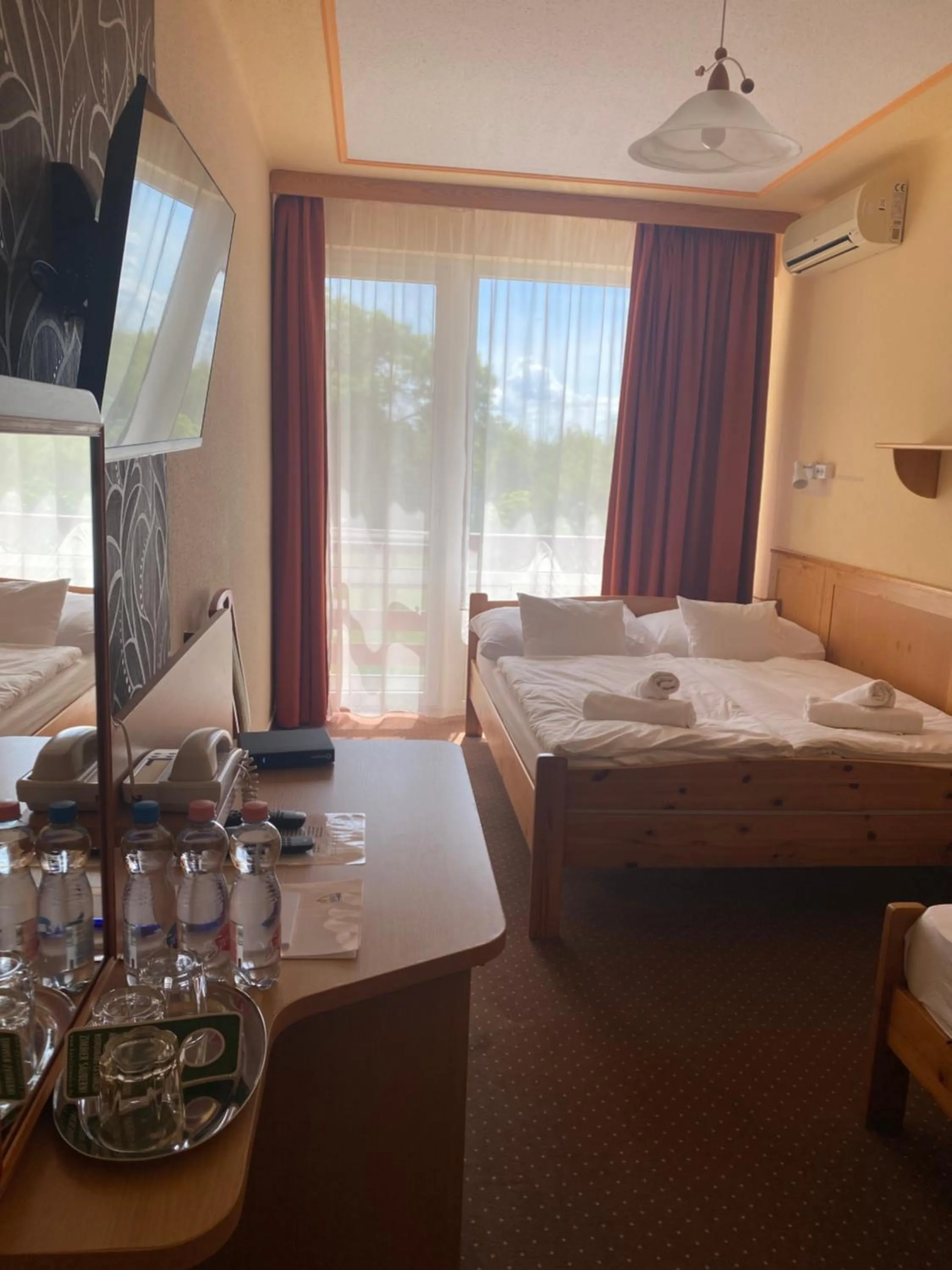 Bed in Nereus Park Hotel