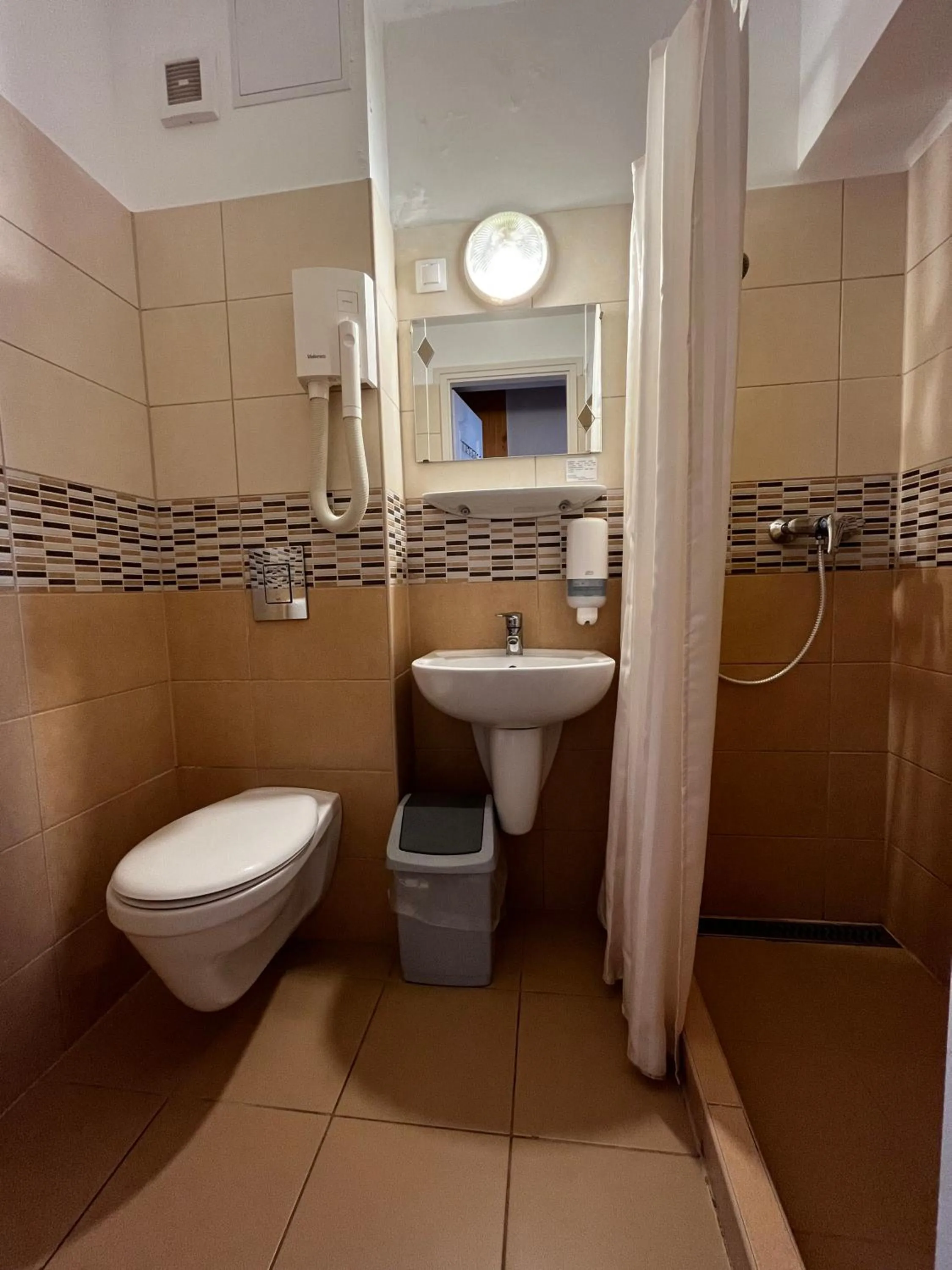 Shower in Nereus Park Hotel