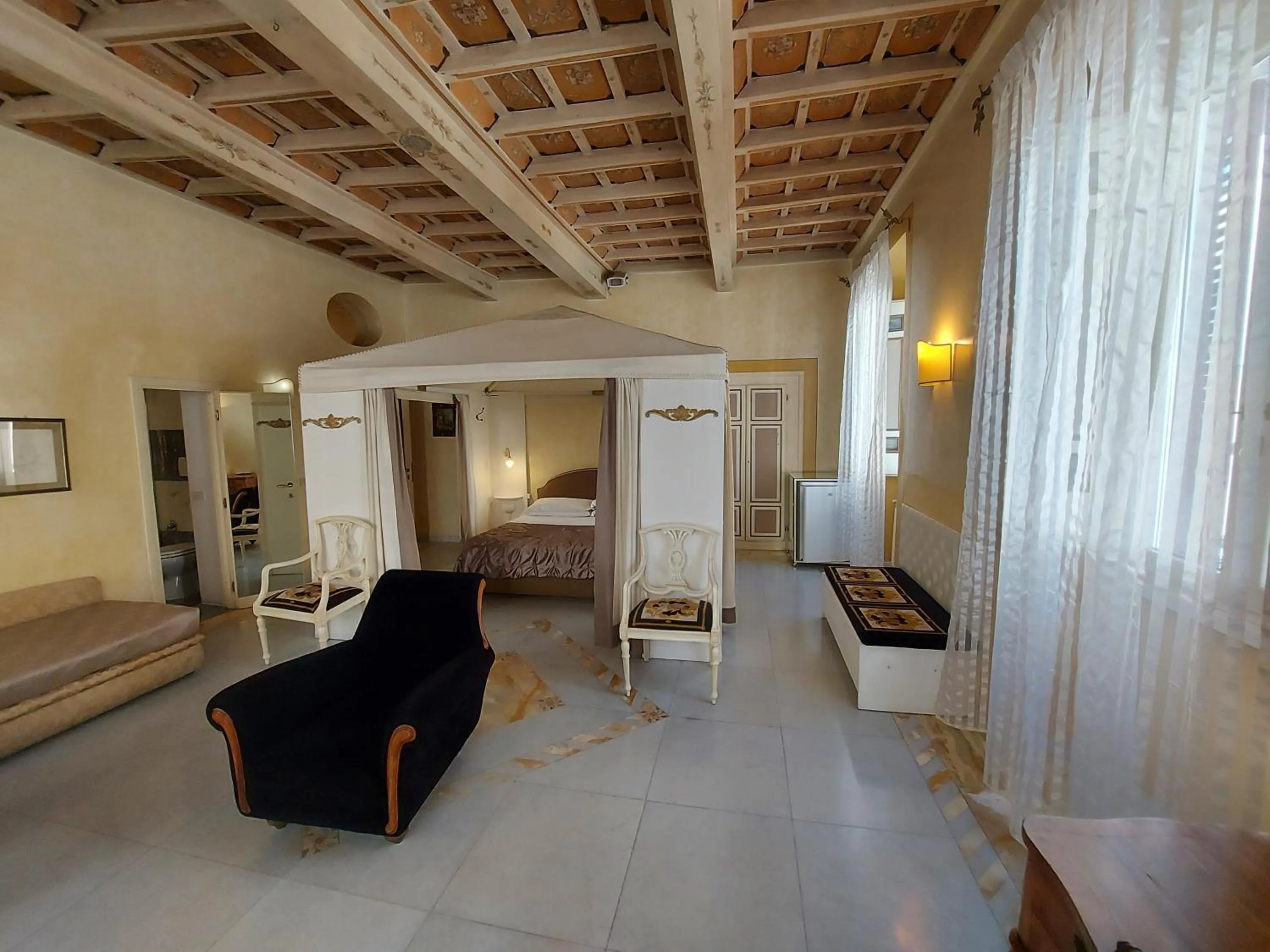 Bedroom in Residenza Al Corso Suites