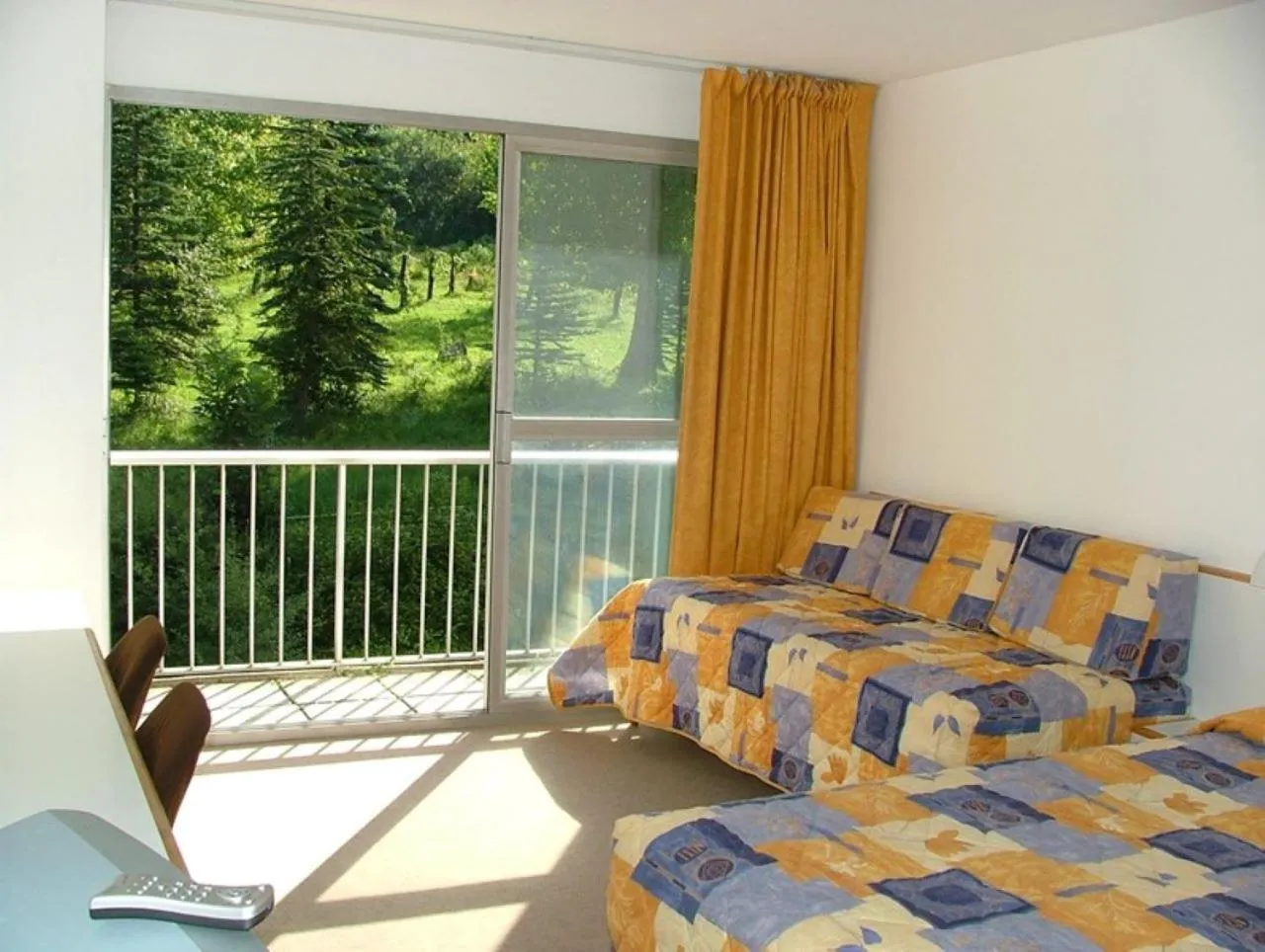 Balcony/Terrace, Bed in Hôtel Restaurant Pavillon Carina