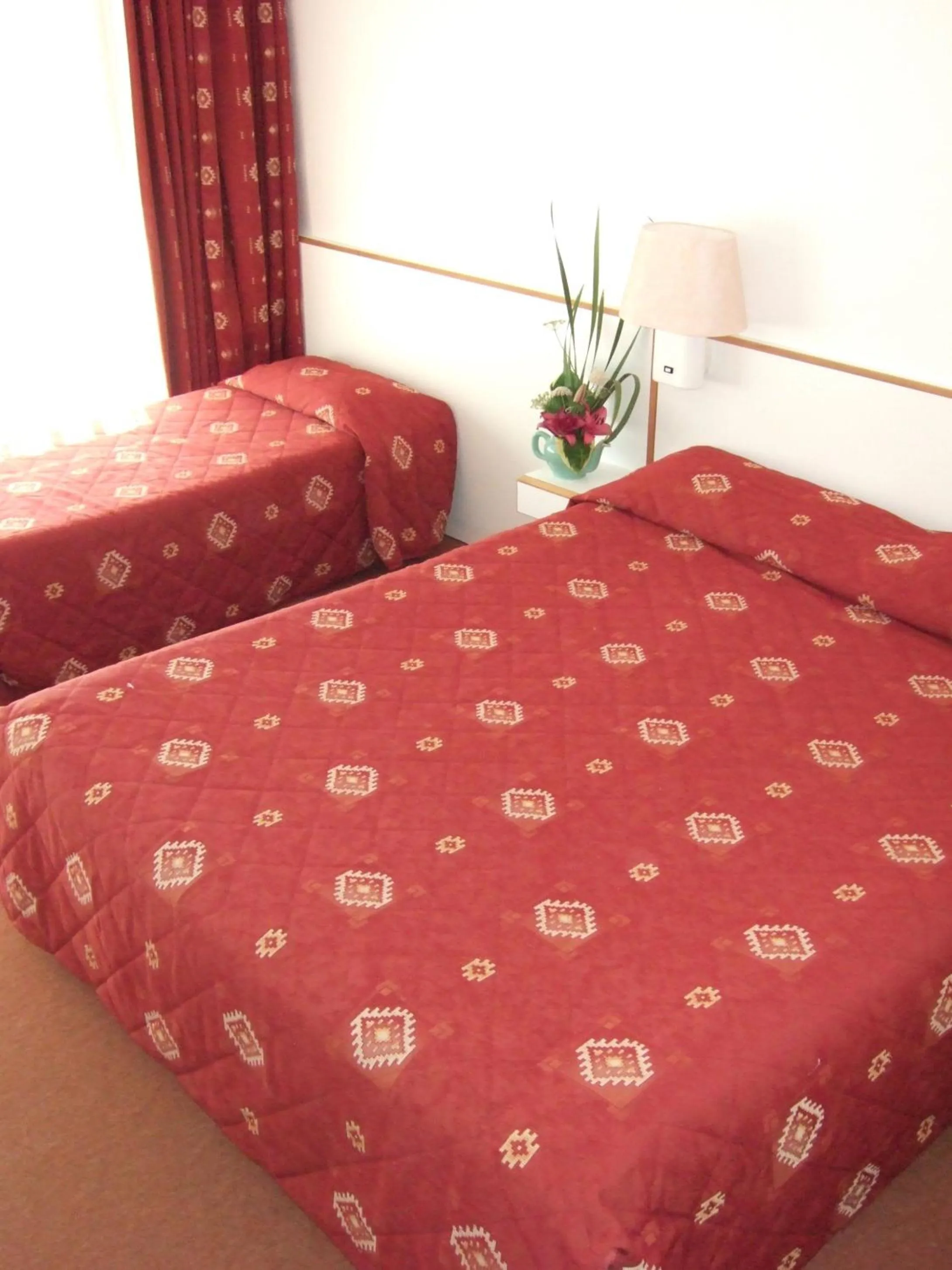 Photo of the whole room, Bed in Hôtel Restaurant Pavillon Carina