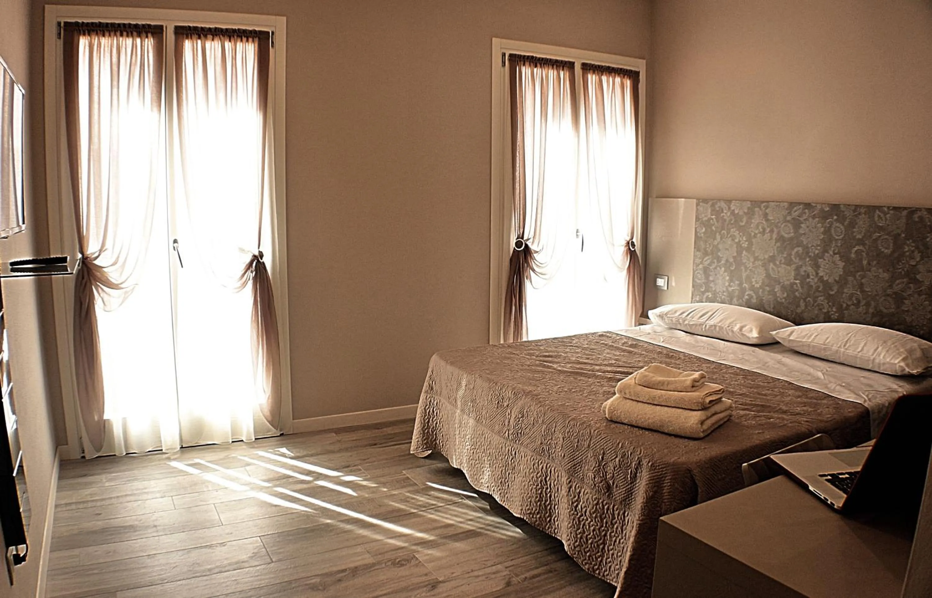 Bed in Lanterna Room&Breakfast