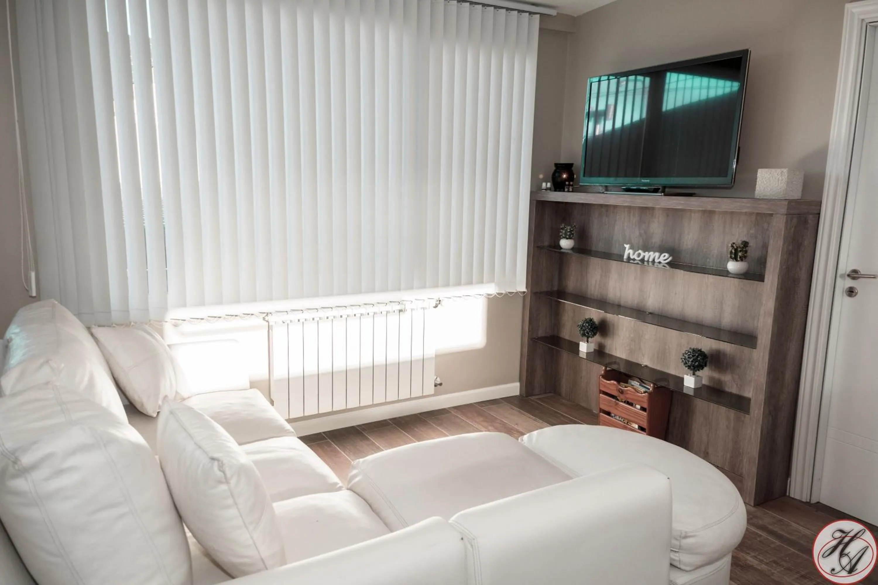 Communal lounge/ TV room in Hosteria y Restaurante America