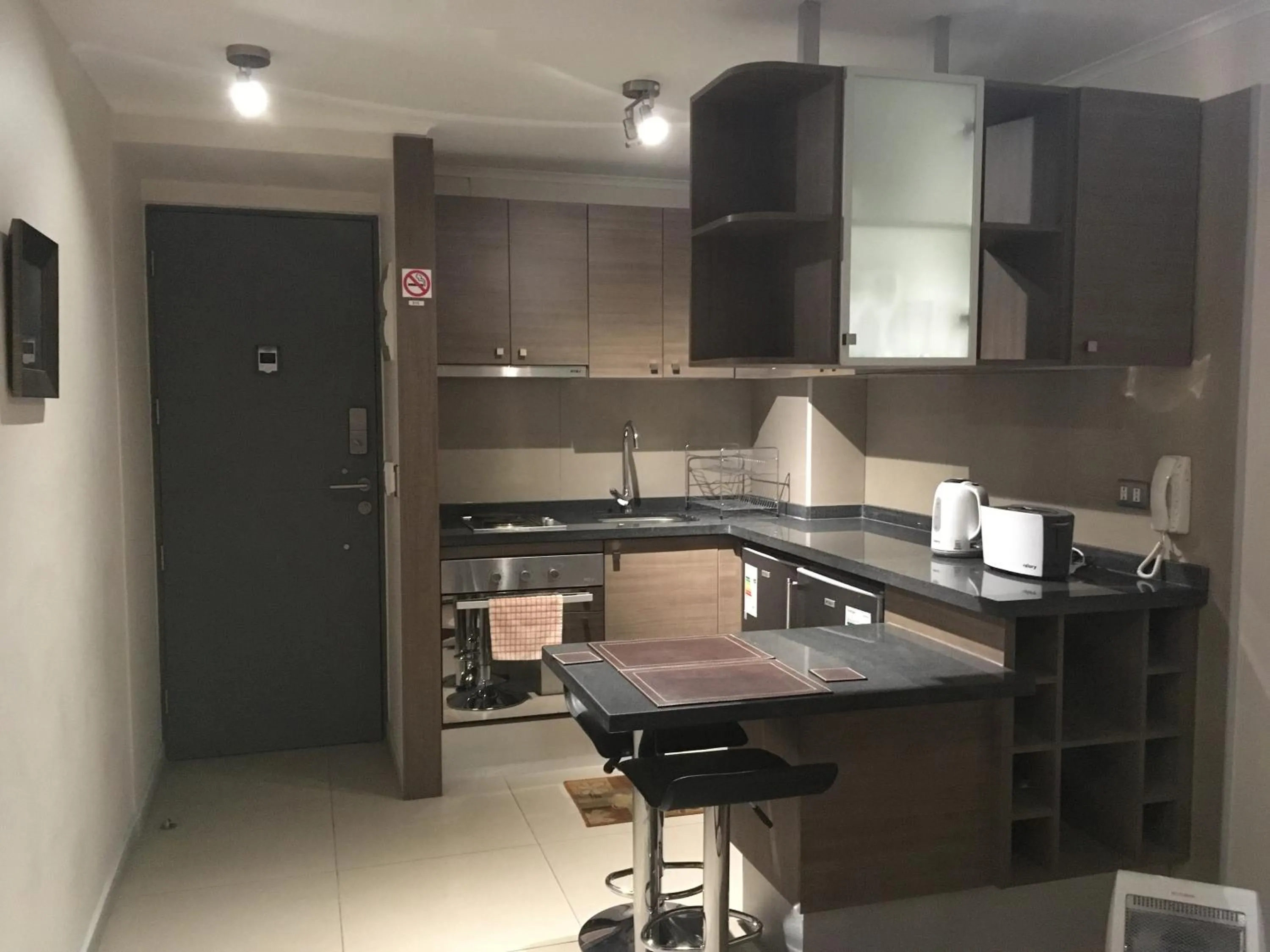 Kitchen or kitchenette in Moneda Express Apart