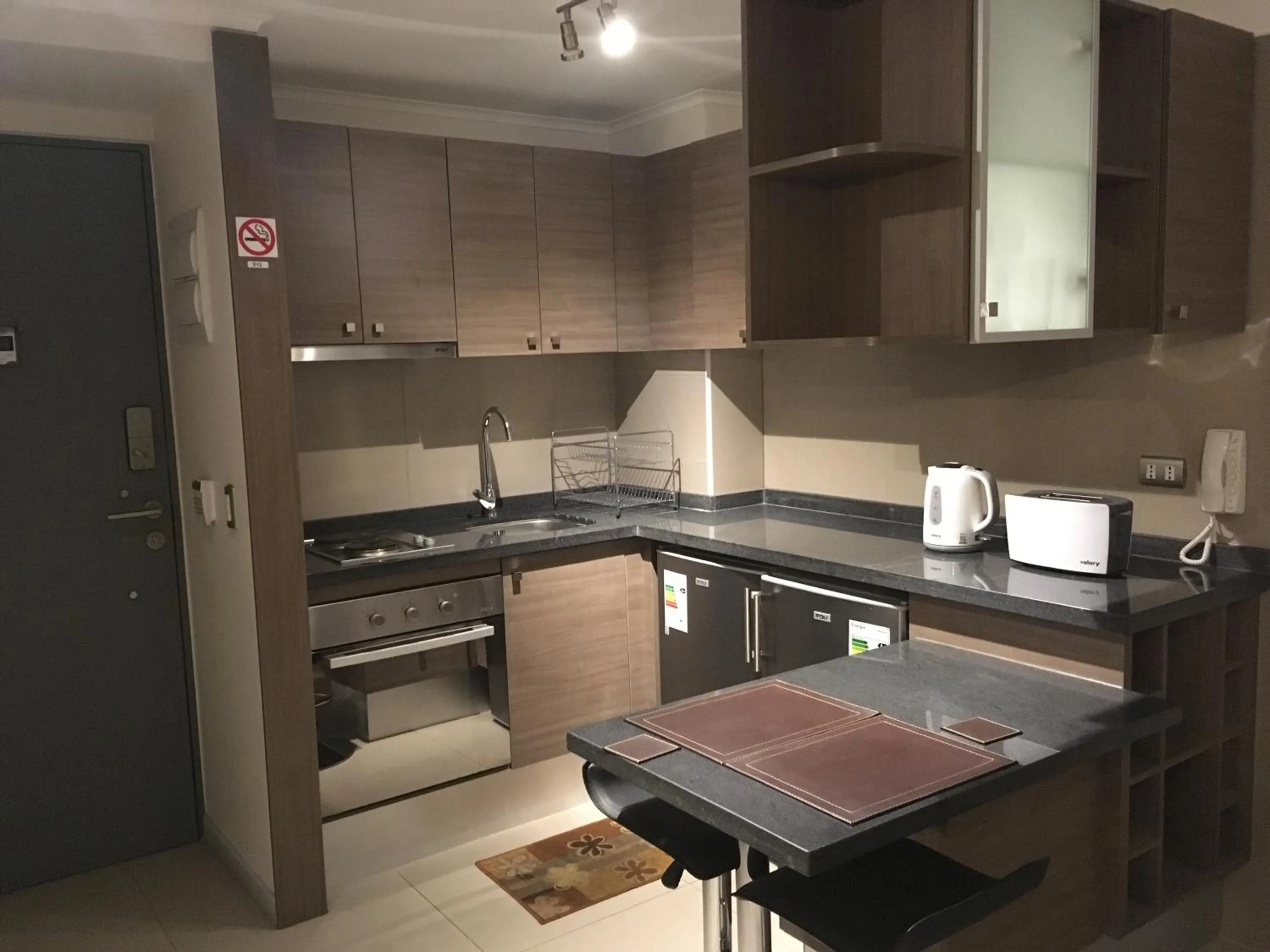 Kitchen or kitchenette in Moneda Express Apart