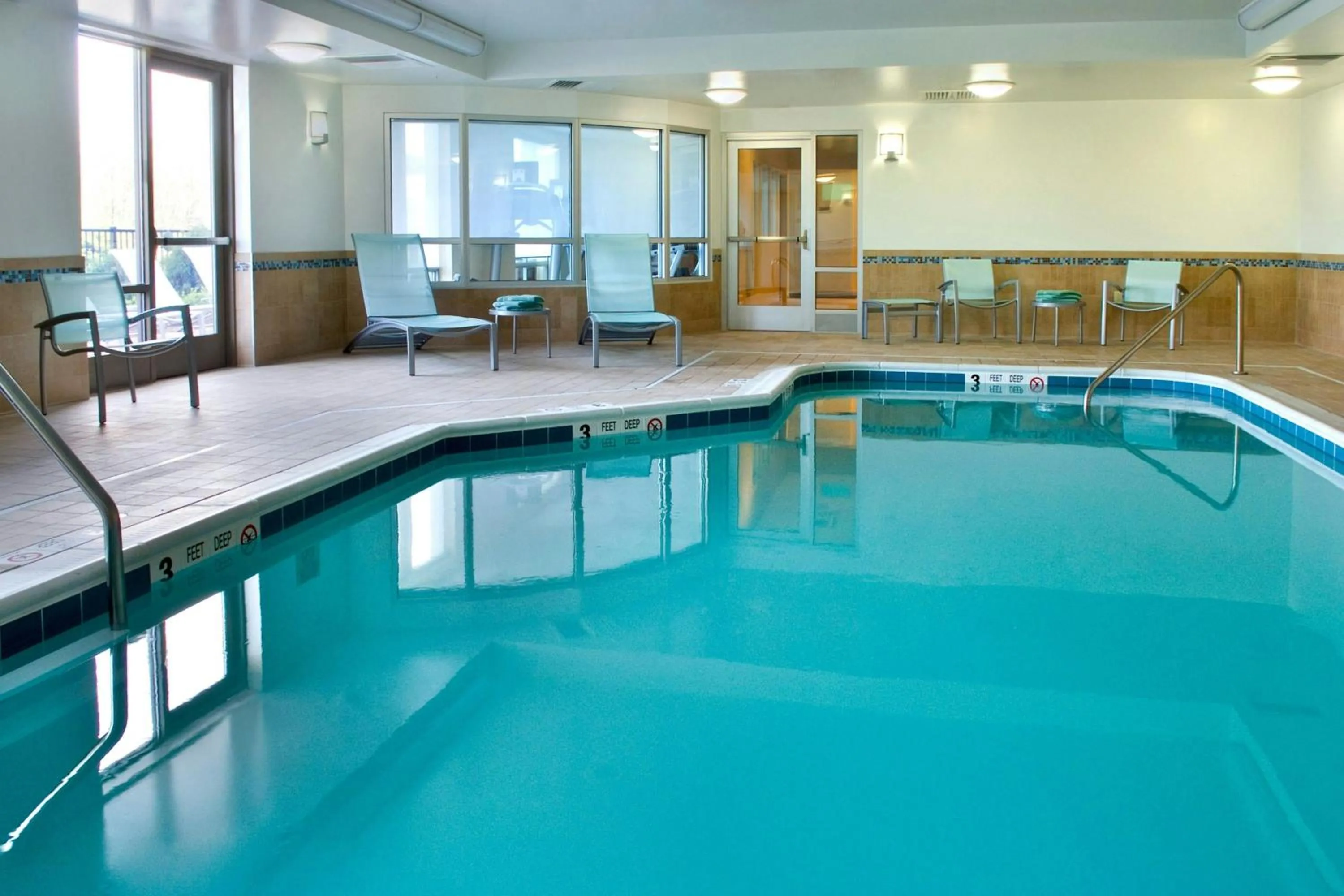 Swimming pool in SpringHill Suites by Marriott Syracuse Carrier Circle