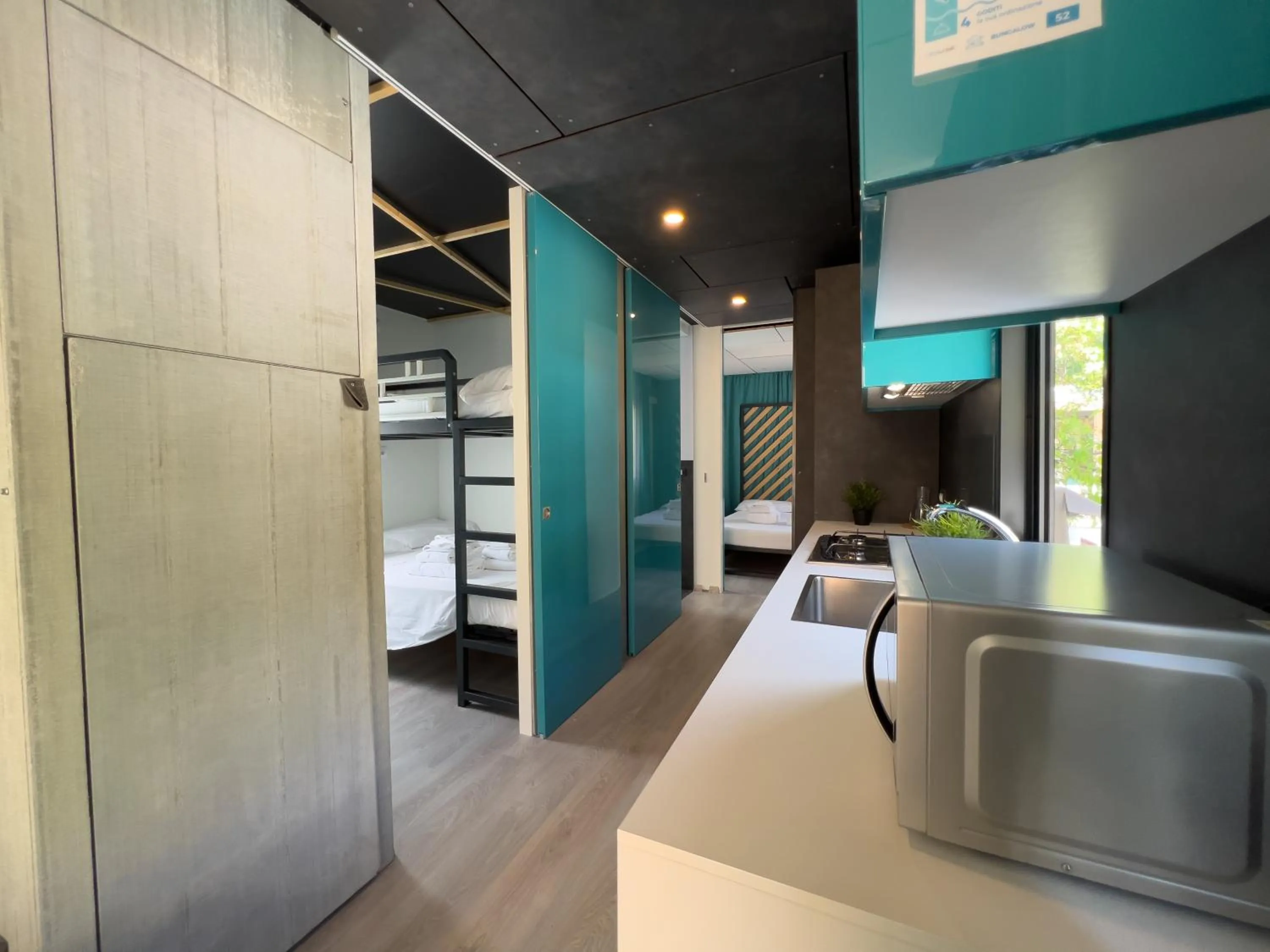 Kitchen or kitchenette, Bed in Le Palme Village