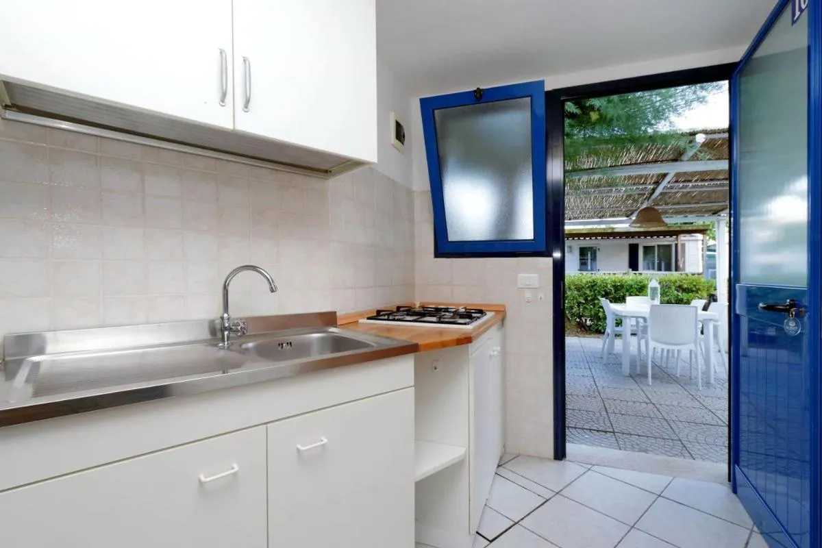 Kitchen or kitchenette in Le Palme Village