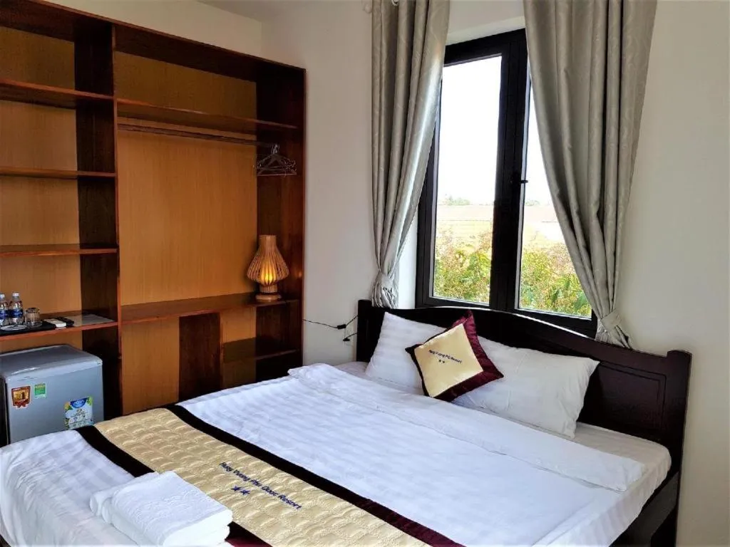 Bed in Hung Vuong Resort