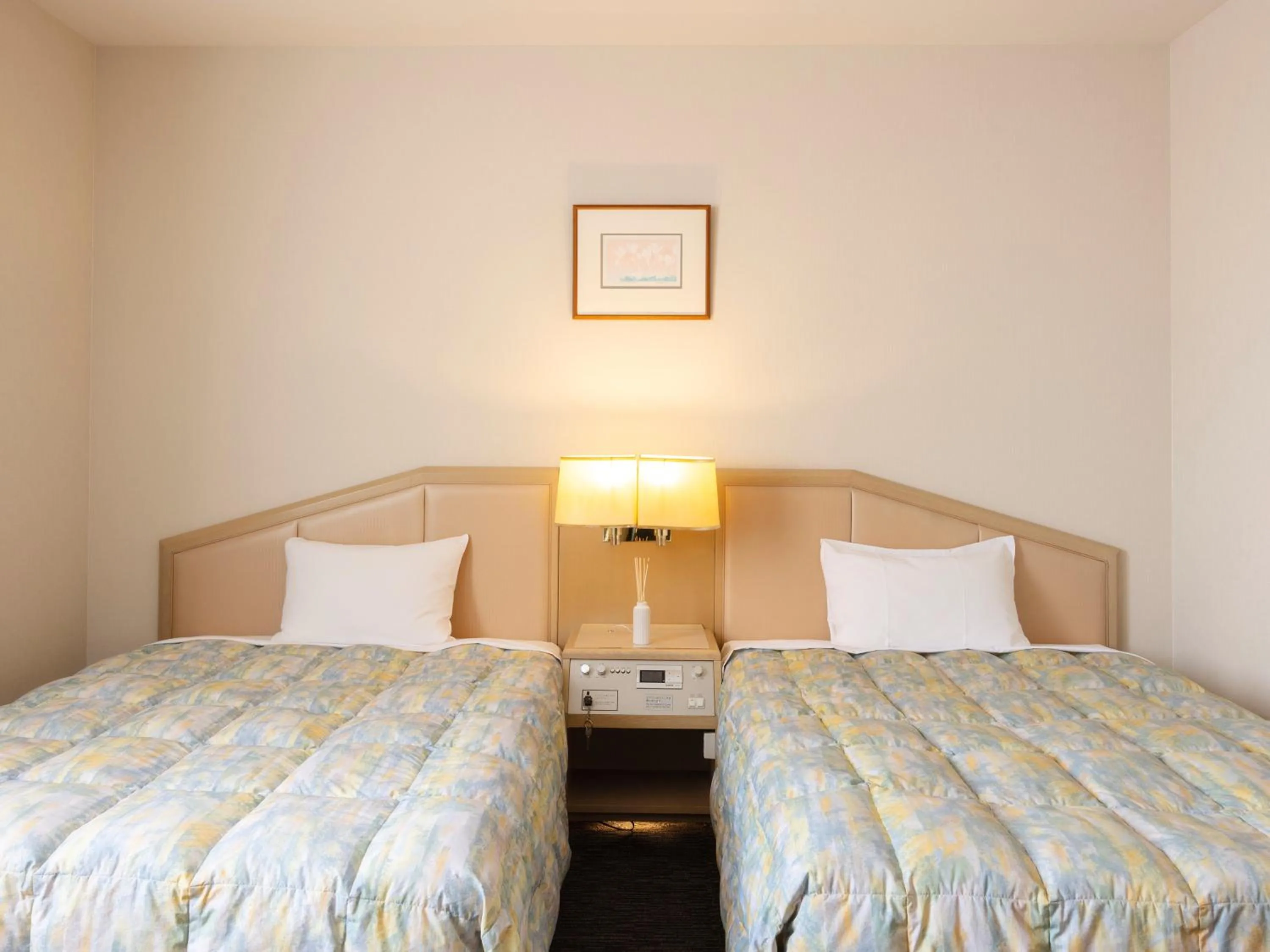 Bed in Tsubamesanjo Washington Hotel