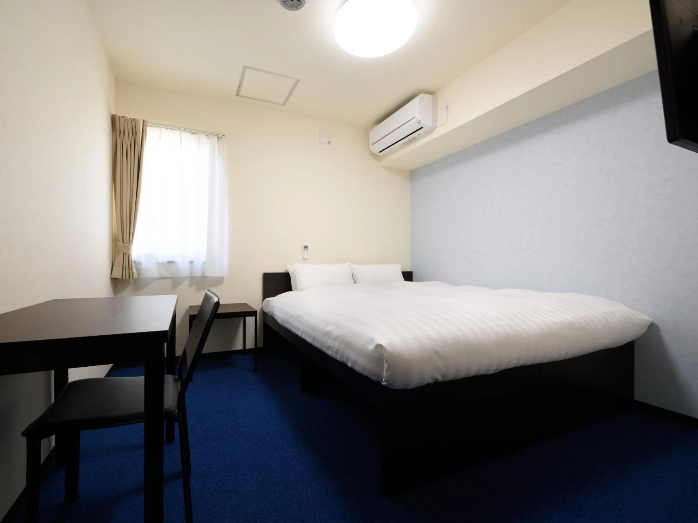 Bed in La'gent Inn Kesennuma