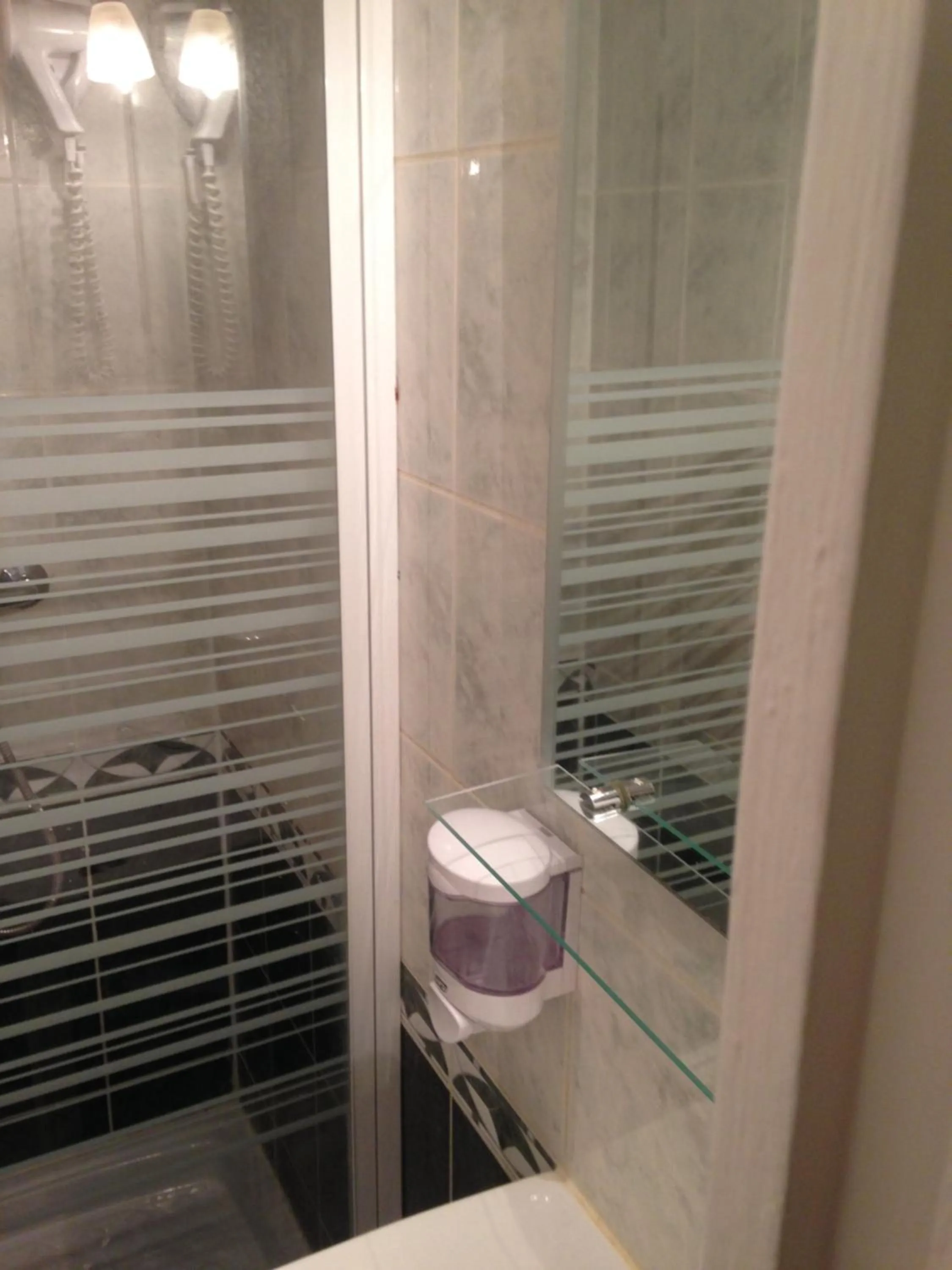 Shower in Hotel Montana Paris Lafayette