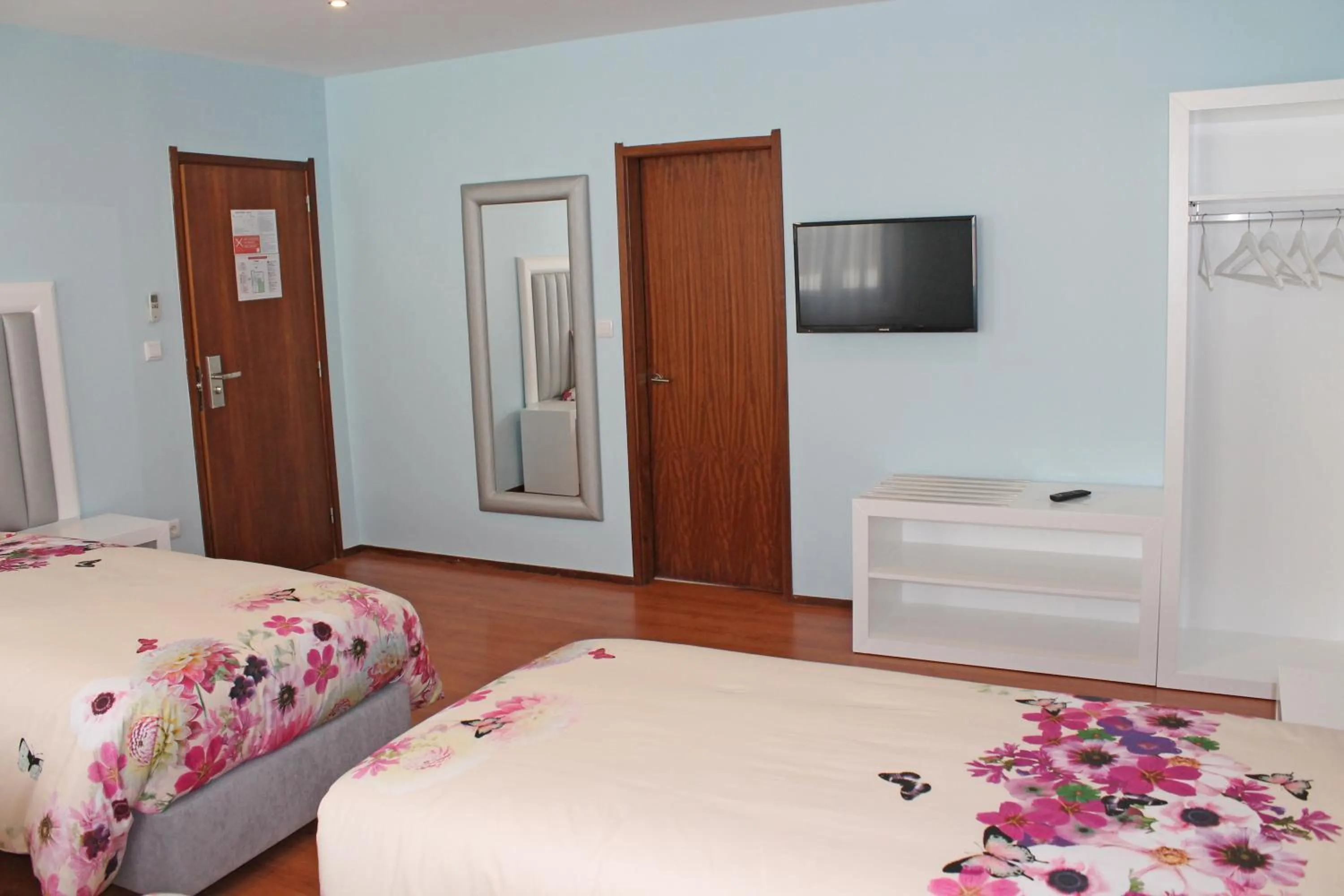 Bedroom, Bed in Grande Oceano Guest House