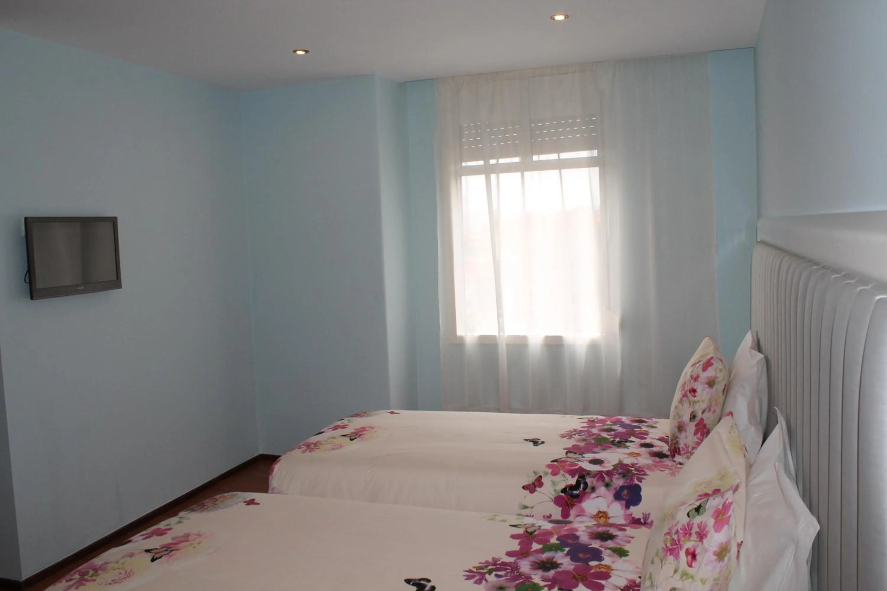 Bedroom, Bed in Grande Oceano Guest House