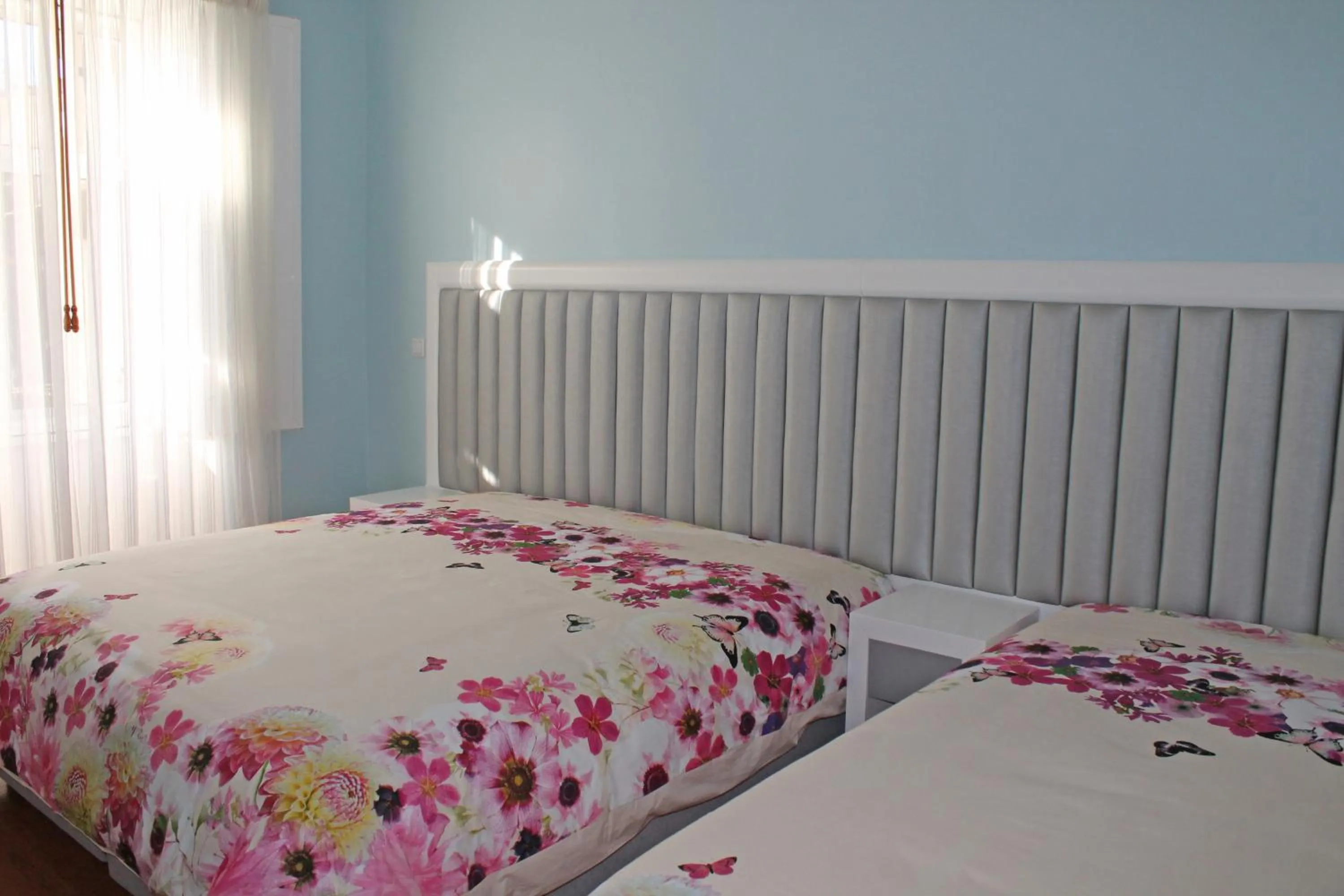 Bedroom, Bed in Grande Oceano Guest House