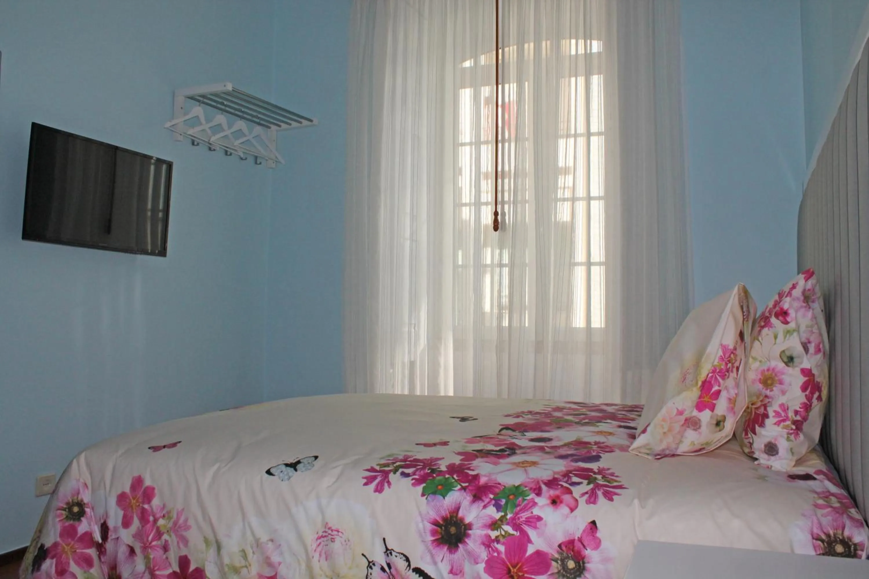 Bedroom, Bed in Grande Oceano Guest House