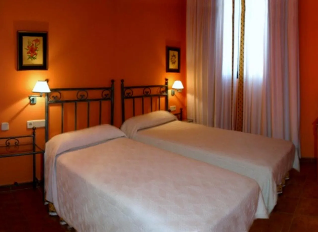 Bed in Hotel y apartamentos La Casa Rural