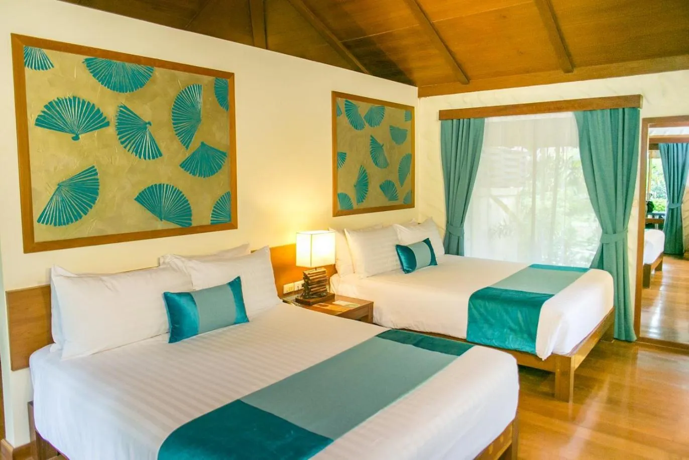 Bed in Centara Koh Chang Tropicana Resort