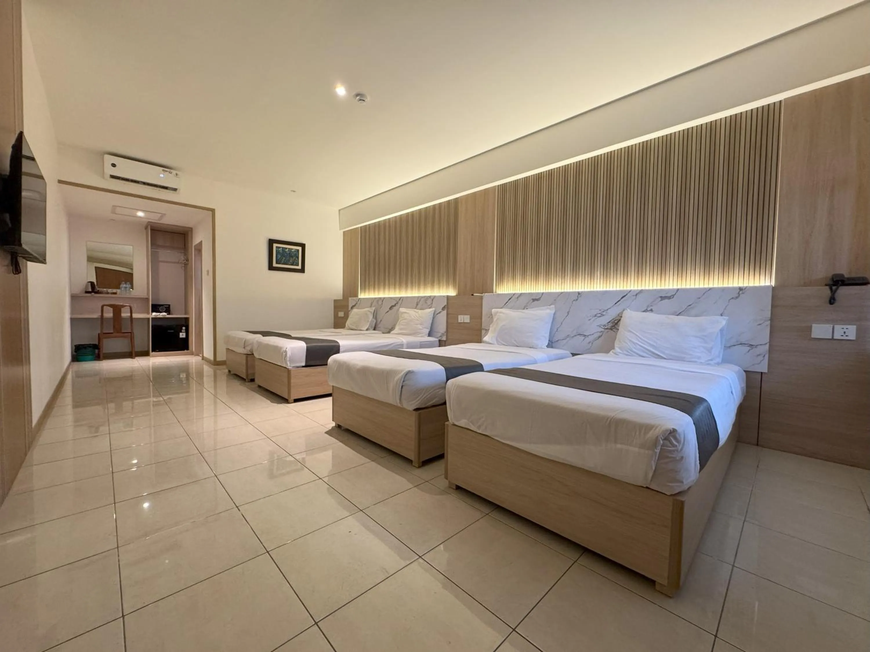 Bed in Mutiara Hotel and Convention