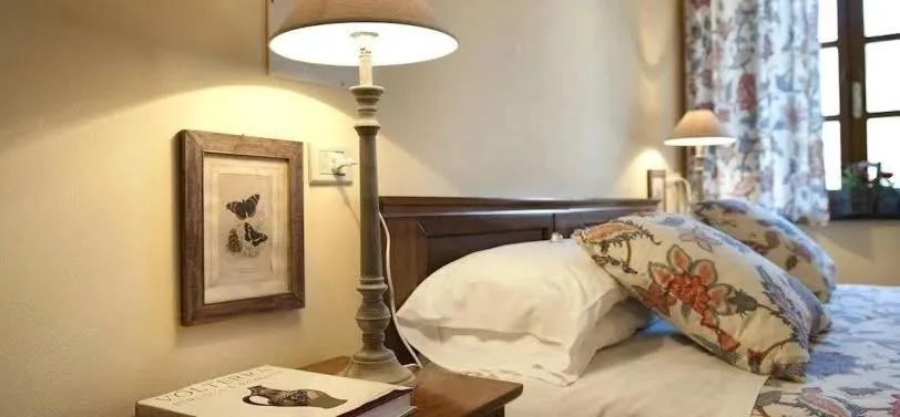 Bed in Molino D'Era Country Hotel