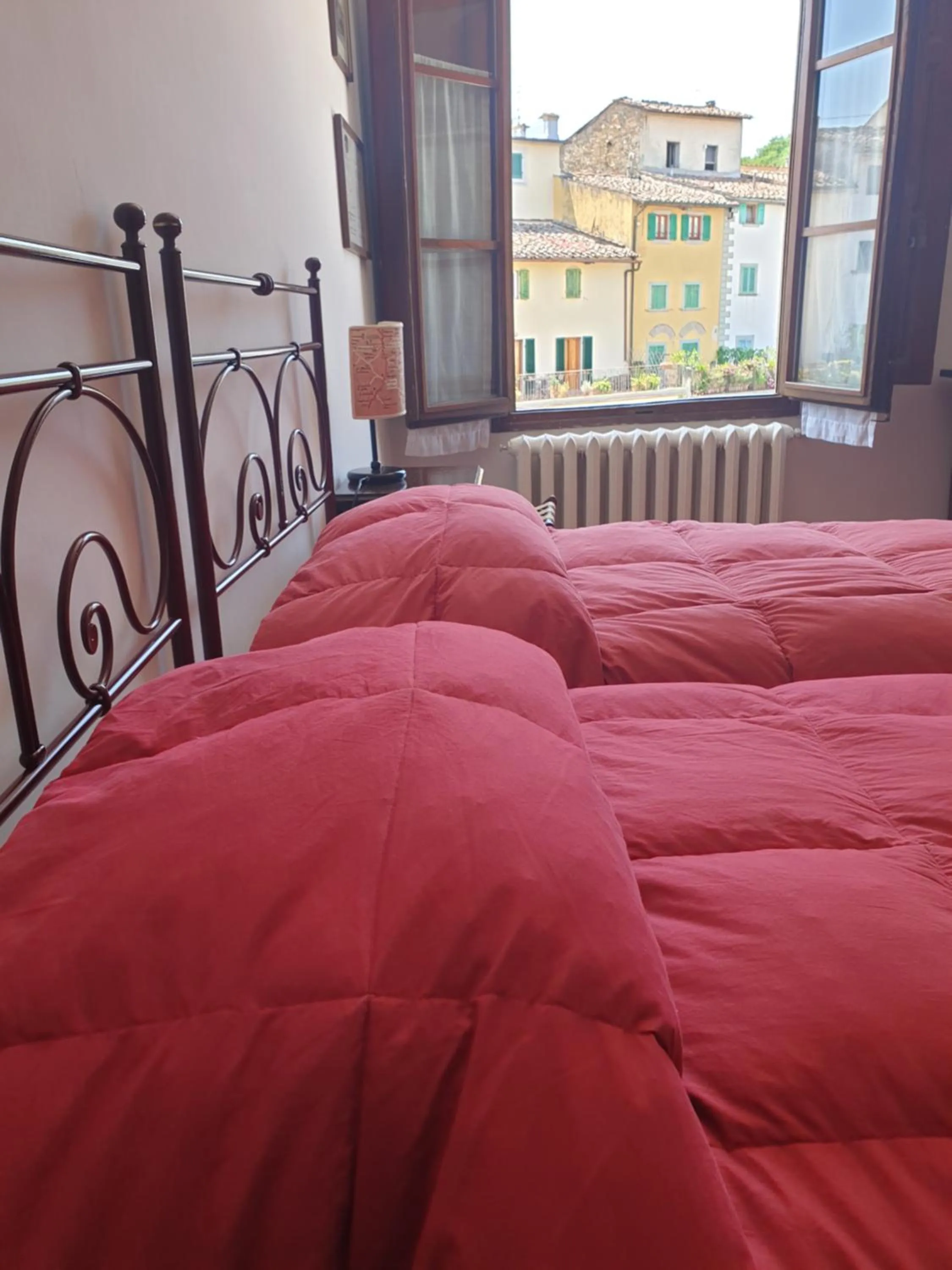 Bed in Albergo Giovanni Da Verrazzano