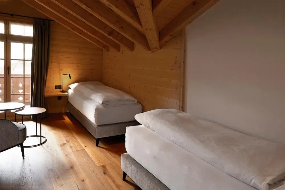 Bed in Hotel Alpenland