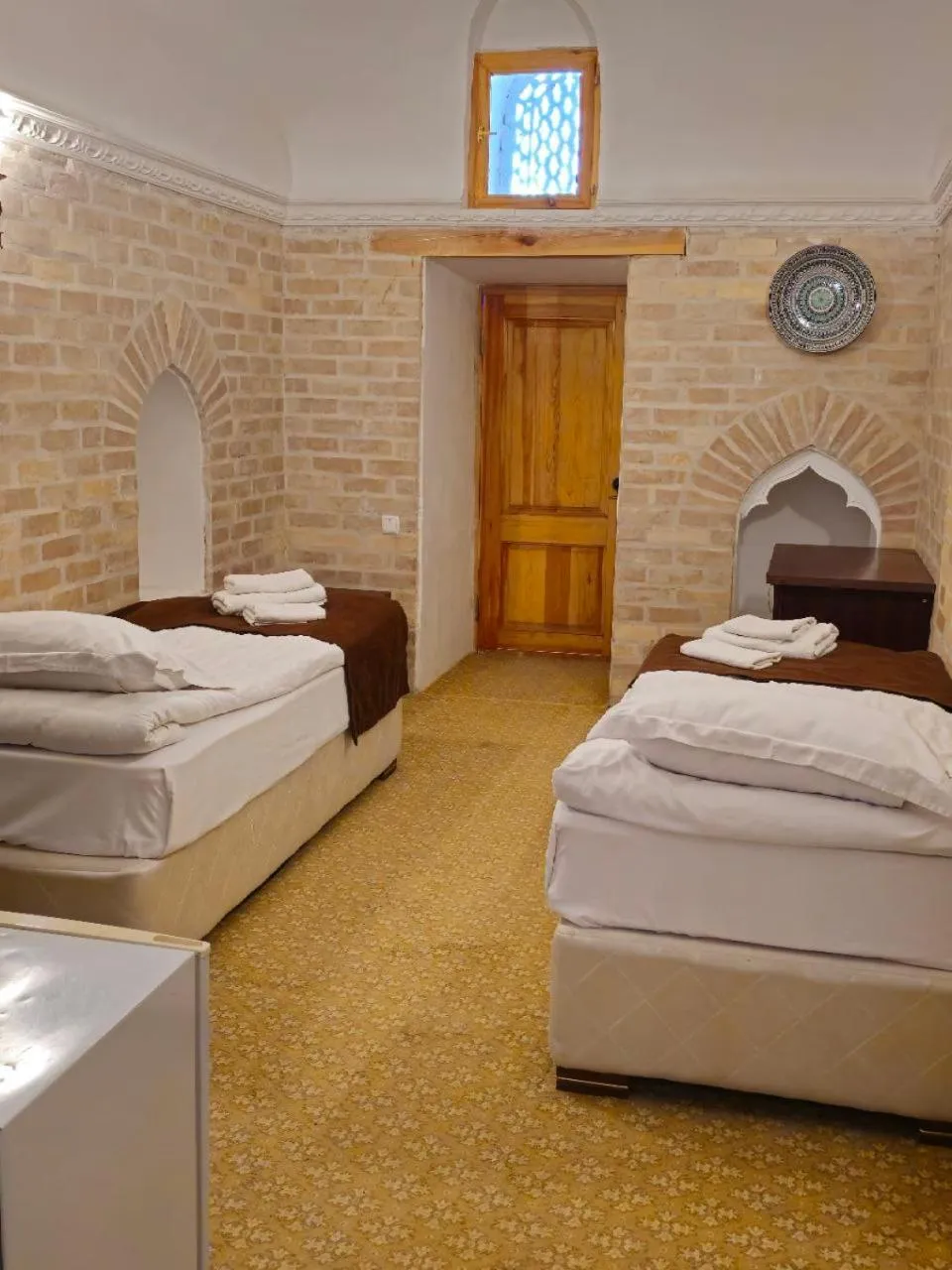 Bed in Orient Star Khiva Hotel- Madrasah Muhammad Aminkhan 1855