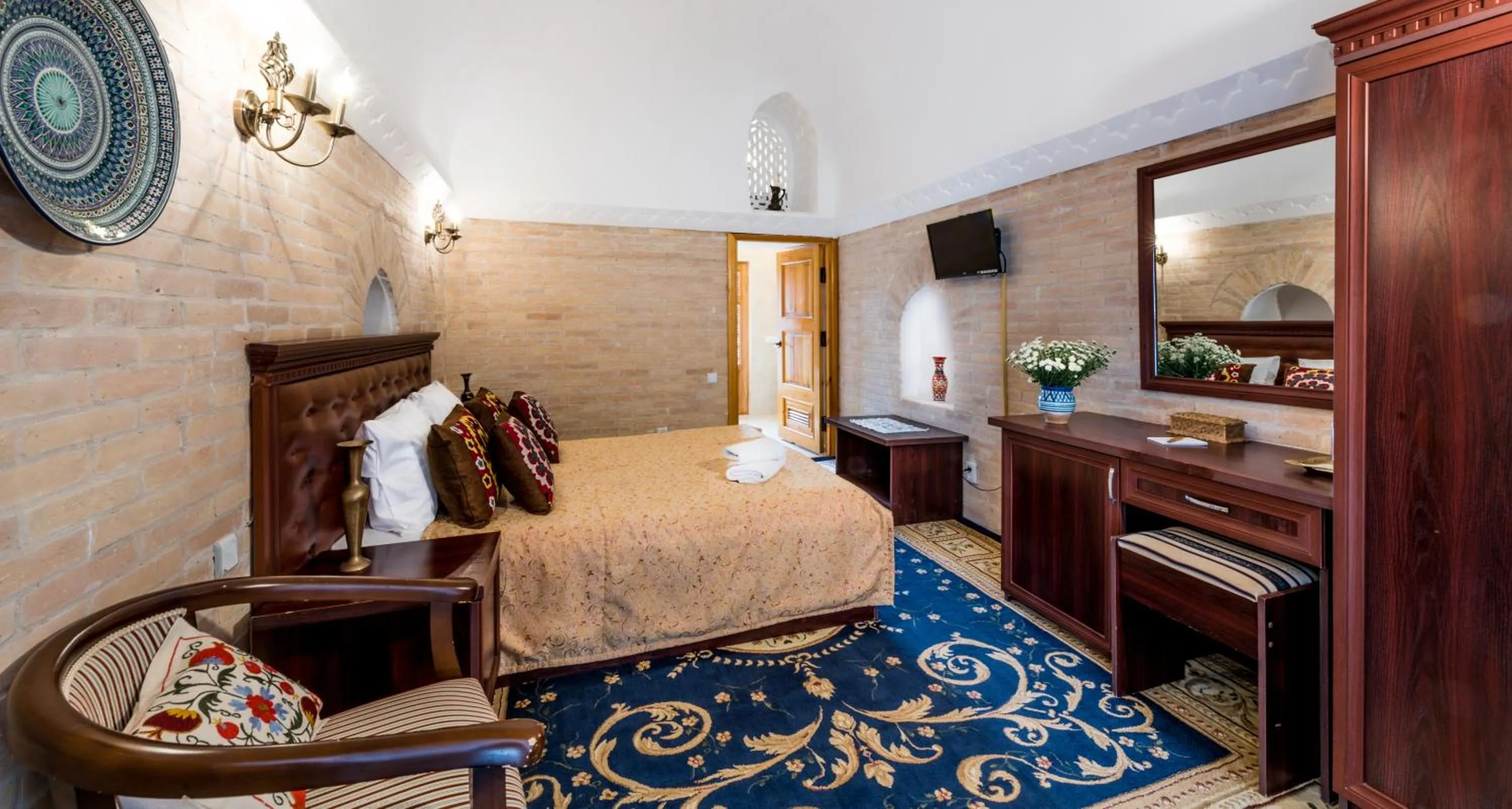 Bed in Orient Star Khiva Hotel- Madrasah Muhammad Aminkhan 1855