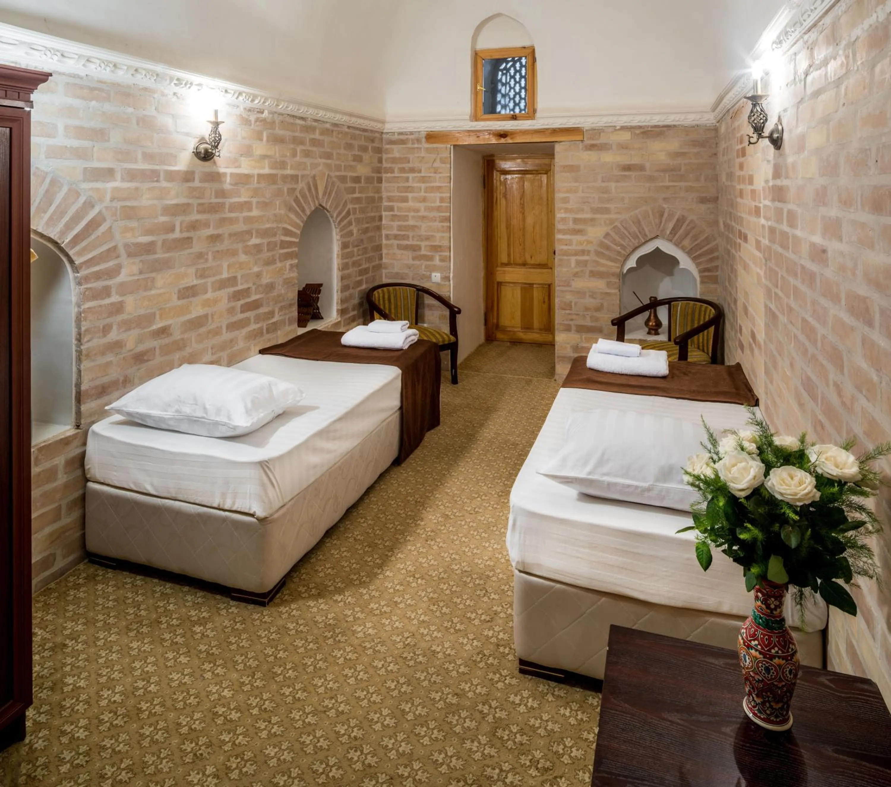 Bed in Orient Star Khiva Hotel- Madrasah Muhammad Aminkhan 1855