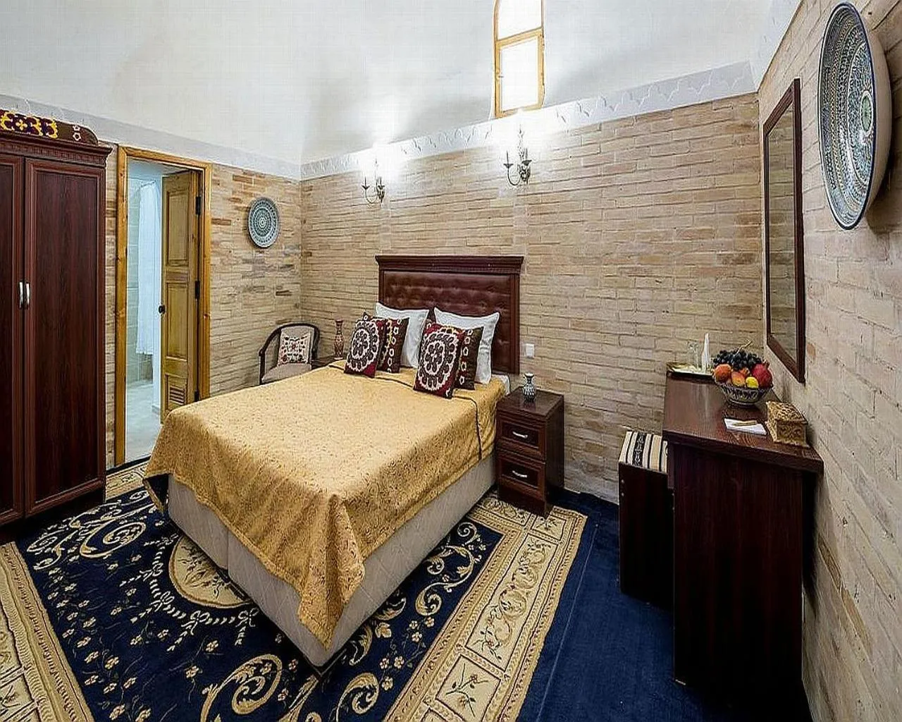 Bed in Orient Star Khiva Hotel- Madrasah Muhammad Aminkhan 1855