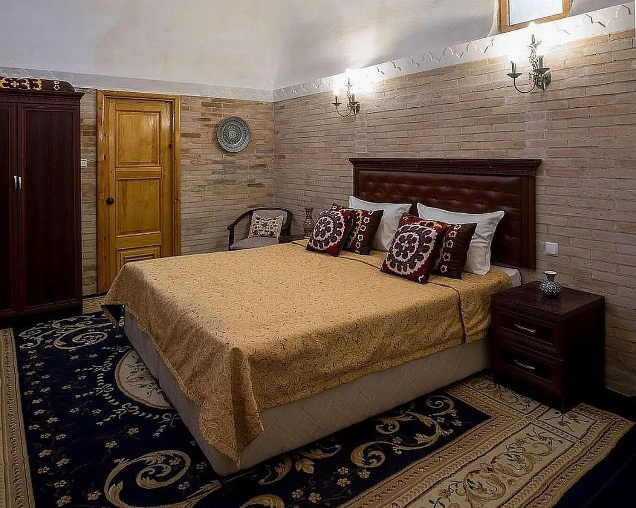 Bed in Orient Star Khiva Hotel- Madrasah Muhammad Aminkhan 1855