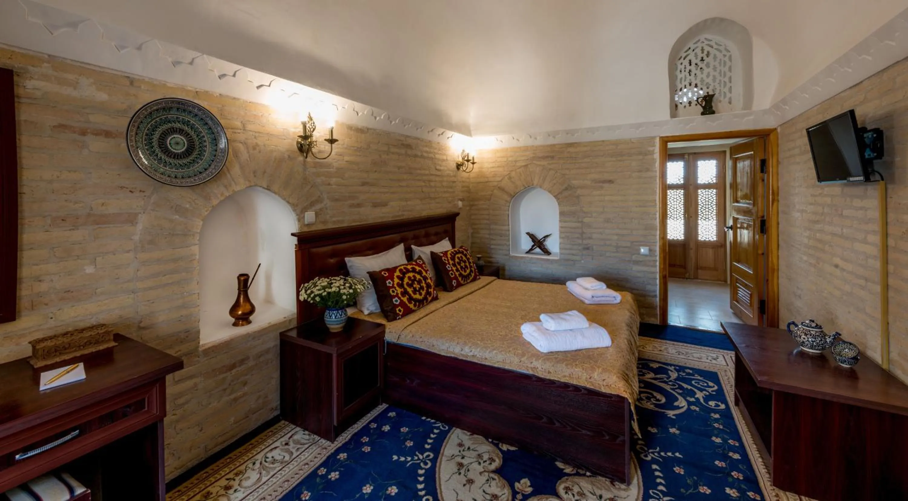 Bed in Orient Star Khiva Hotel- Madrasah Muhammad Aminkhan 1855